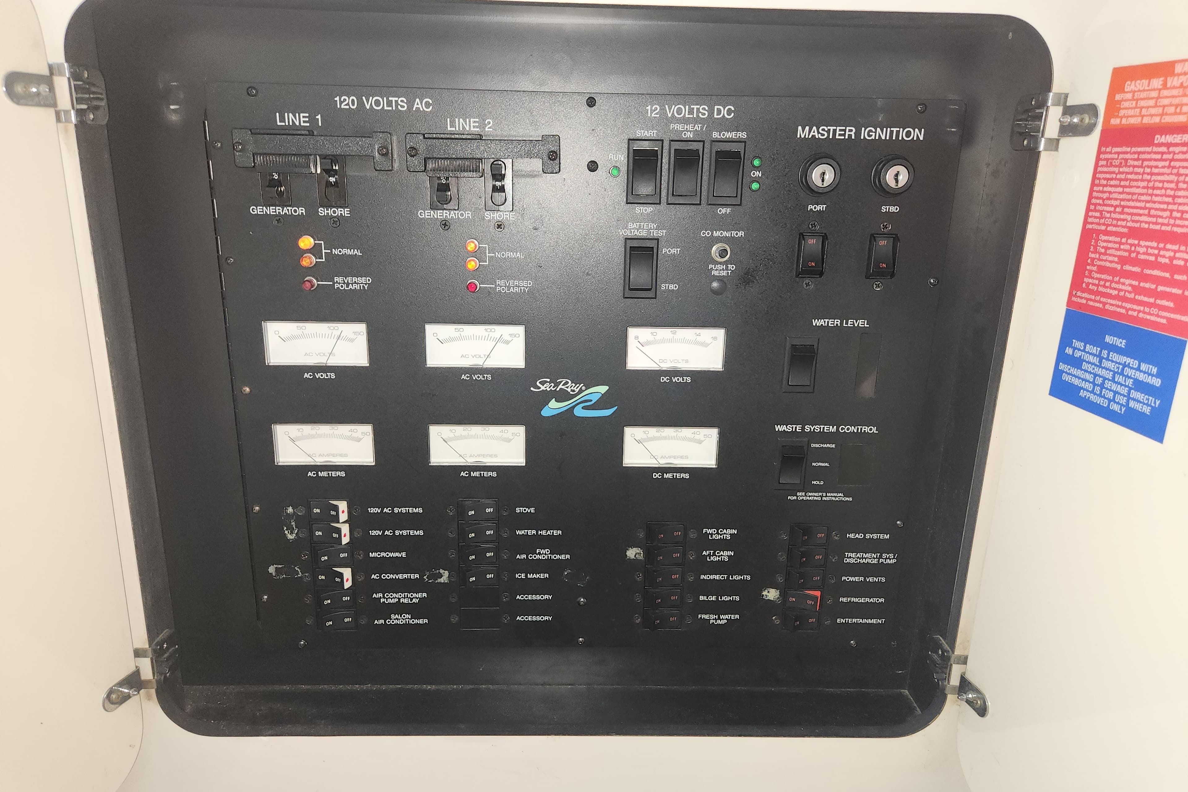 Electrical control panel of a 1996 Sea Ray 370 Sedan Bridge boat.
