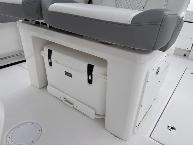 Edgewater 285CC seating with integrated storage, 2026 model.