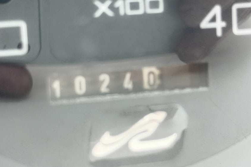 Close-up of a 1998 Sea Ray 370 Express Cruiser odometer reading 10240.