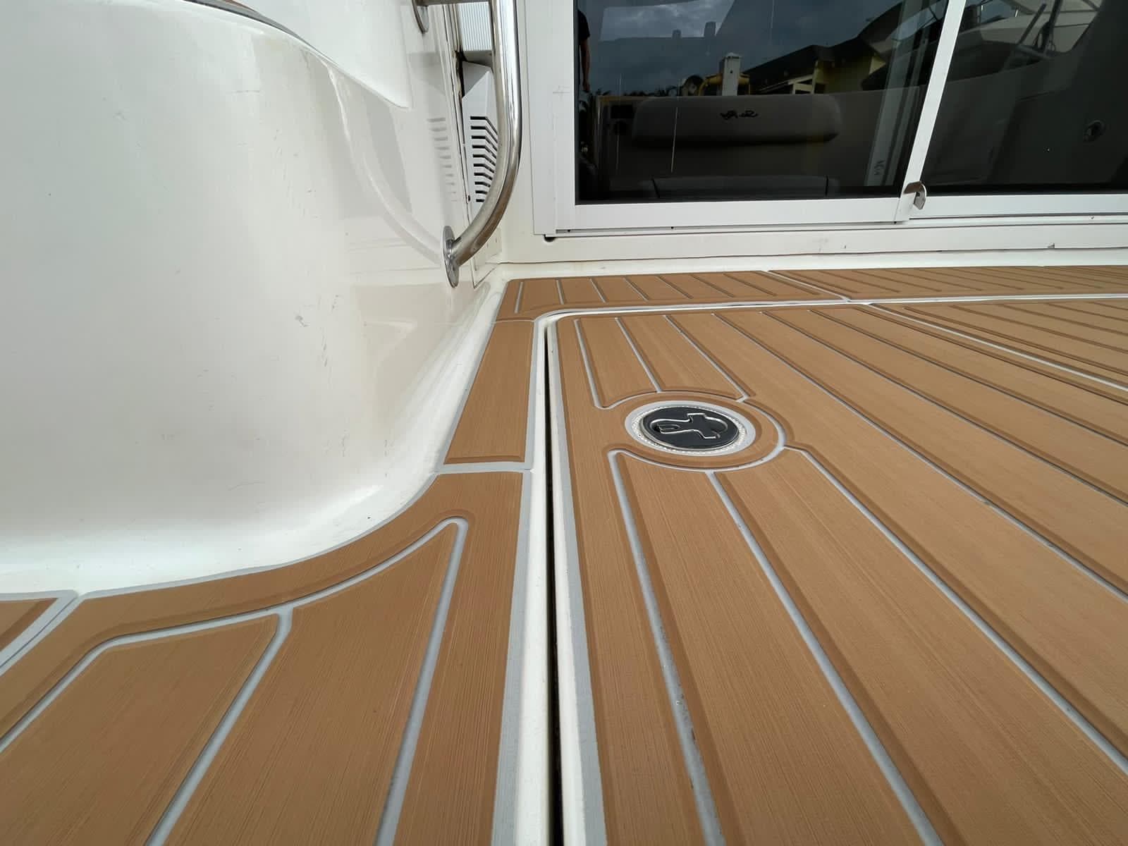 2007 Sea Ray 360 Sedan Bridge deck with teak flooring and sleek design.