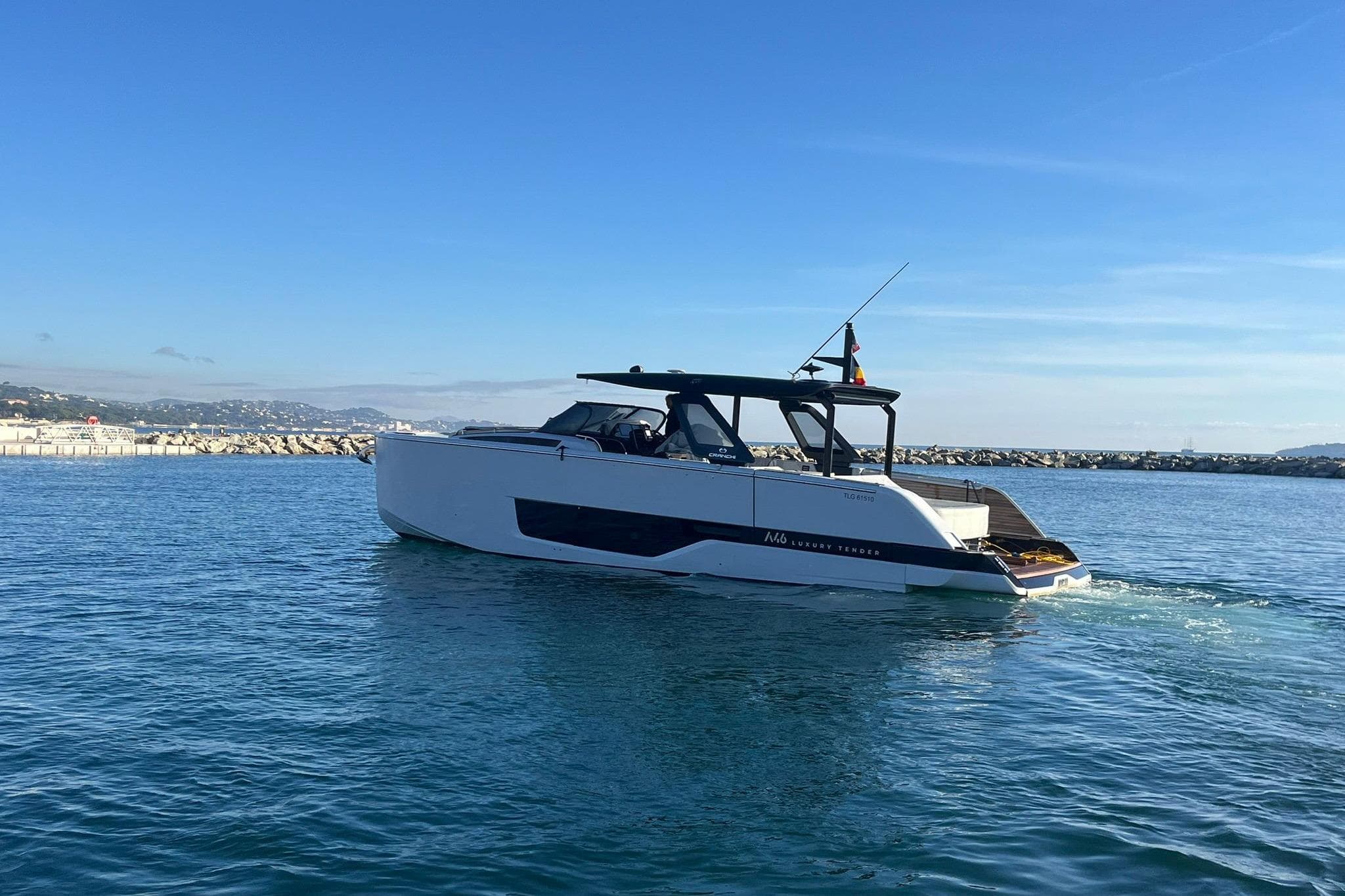 2023 Cranchi A46 Luxury Tender cruising on calm blue waters.