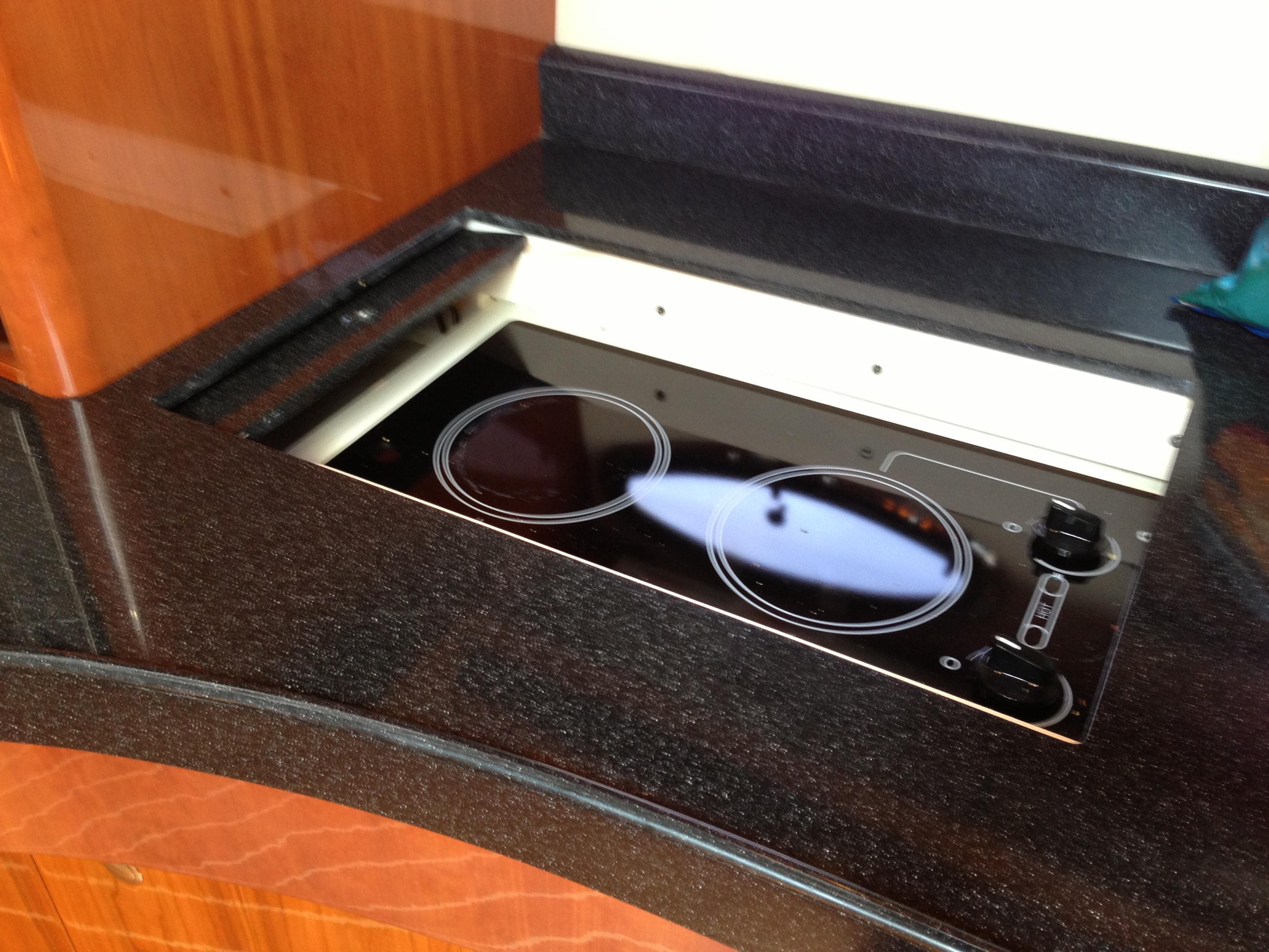 Built-in stovetop on 2008 Regal Commodore 4460 yacht kitchen counter.