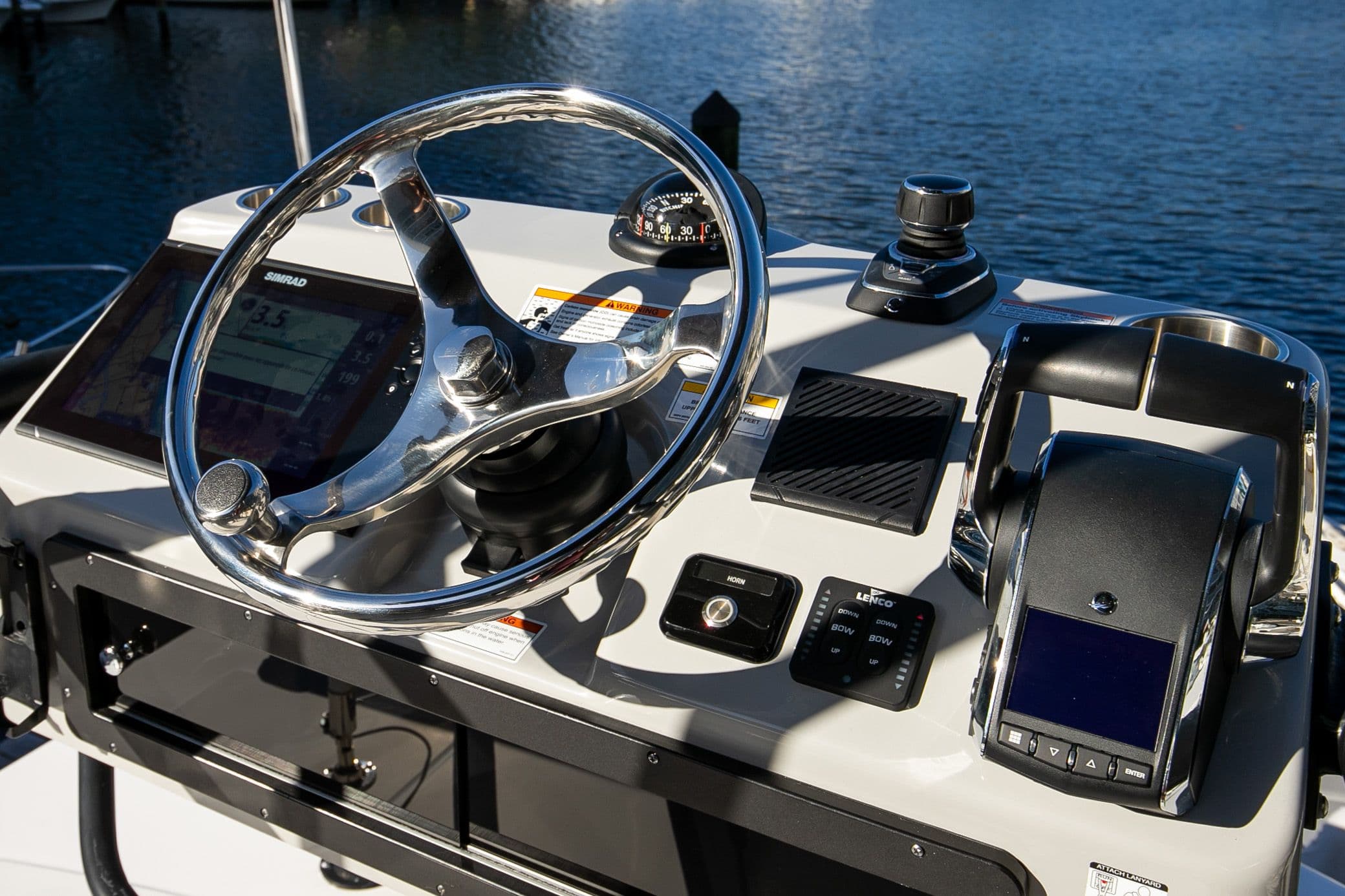 Boston Whaler 360 Outrage 2023 helm with modern electronics.