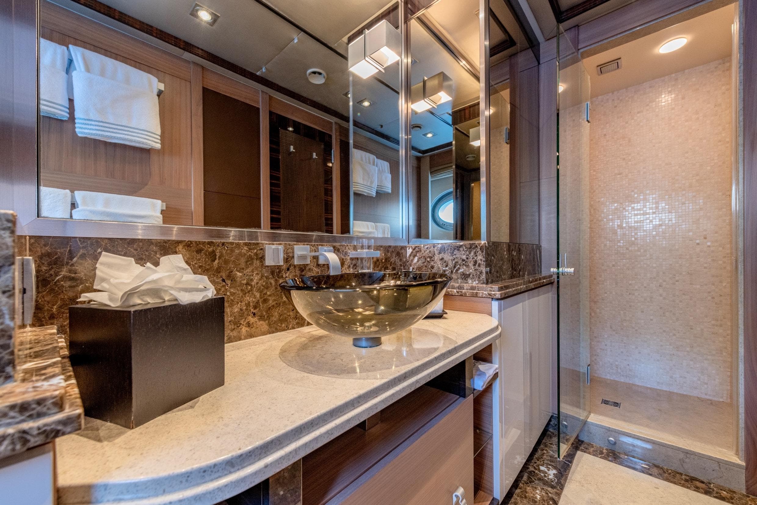 Luxurious bathroom in 2008 Palmer Marine PJ150 yacht with elegant fixtures and marble accents.