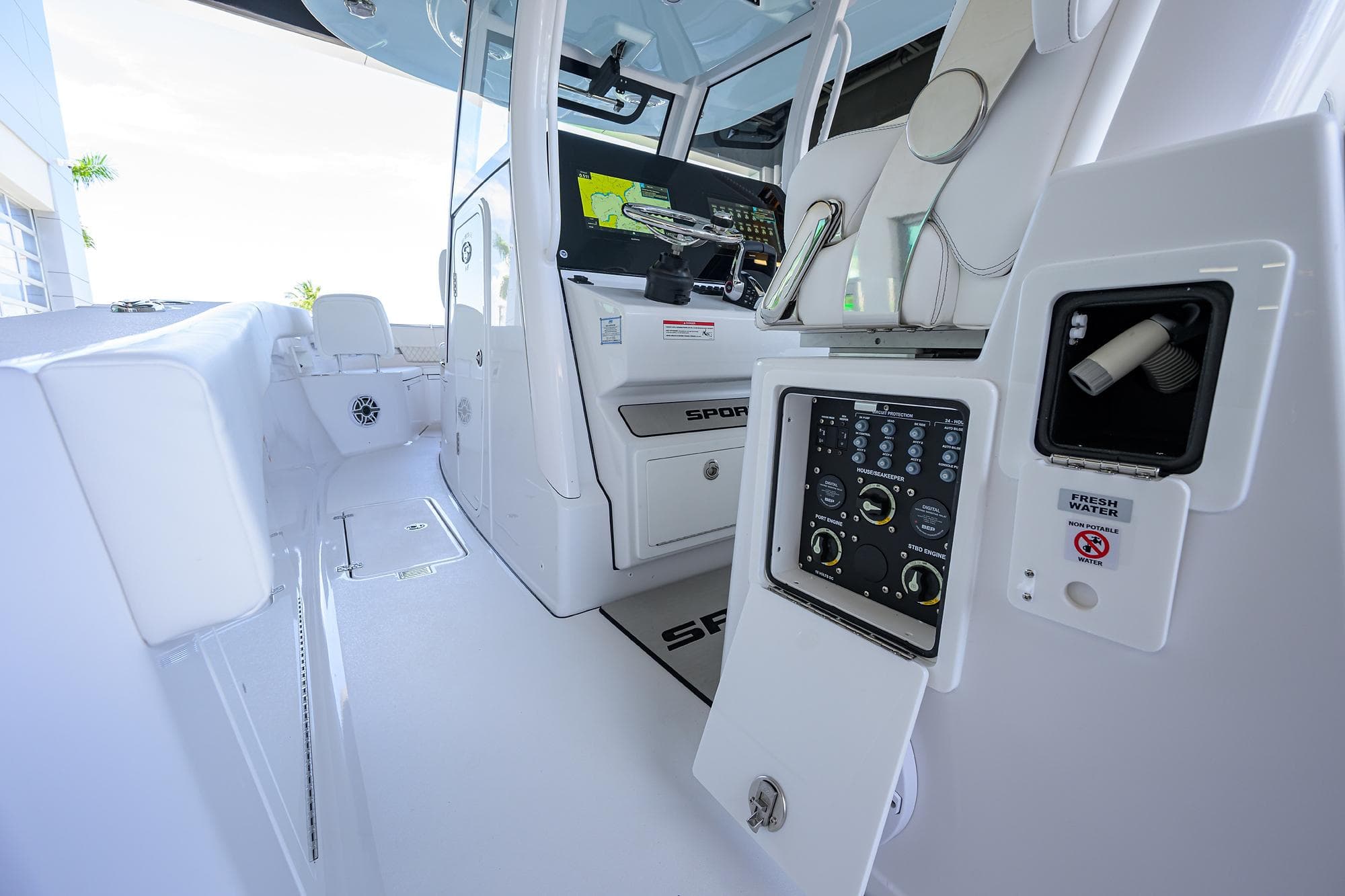 2026 Sportsman Heritage 321 Center Console interior with control panel and seating.