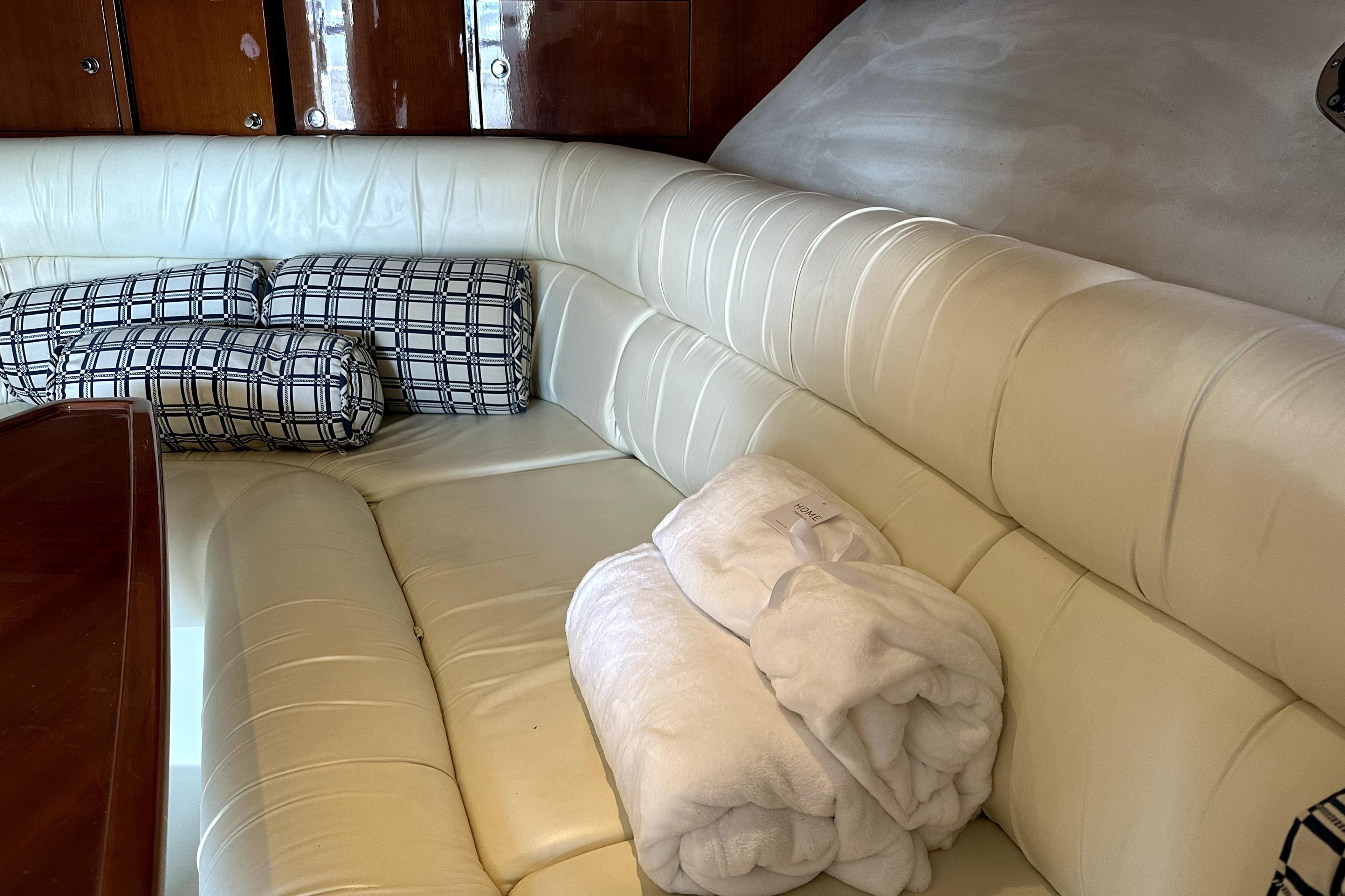 Luxurious white leather seating in 2003 Donzi 39 ZSC yacht interior.