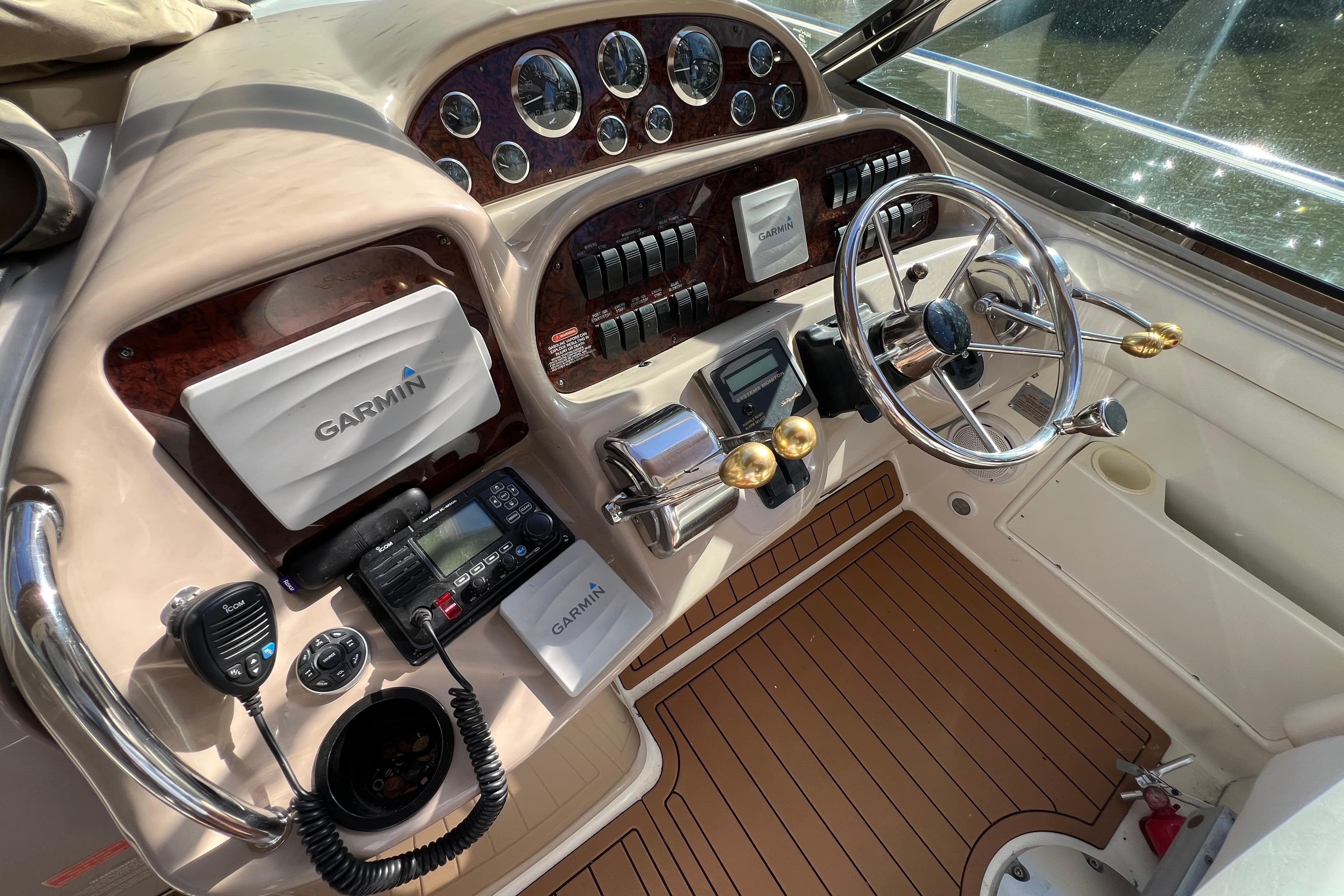 2002 Sea Ray 360 Sundancer Helm with Electronics Covers on