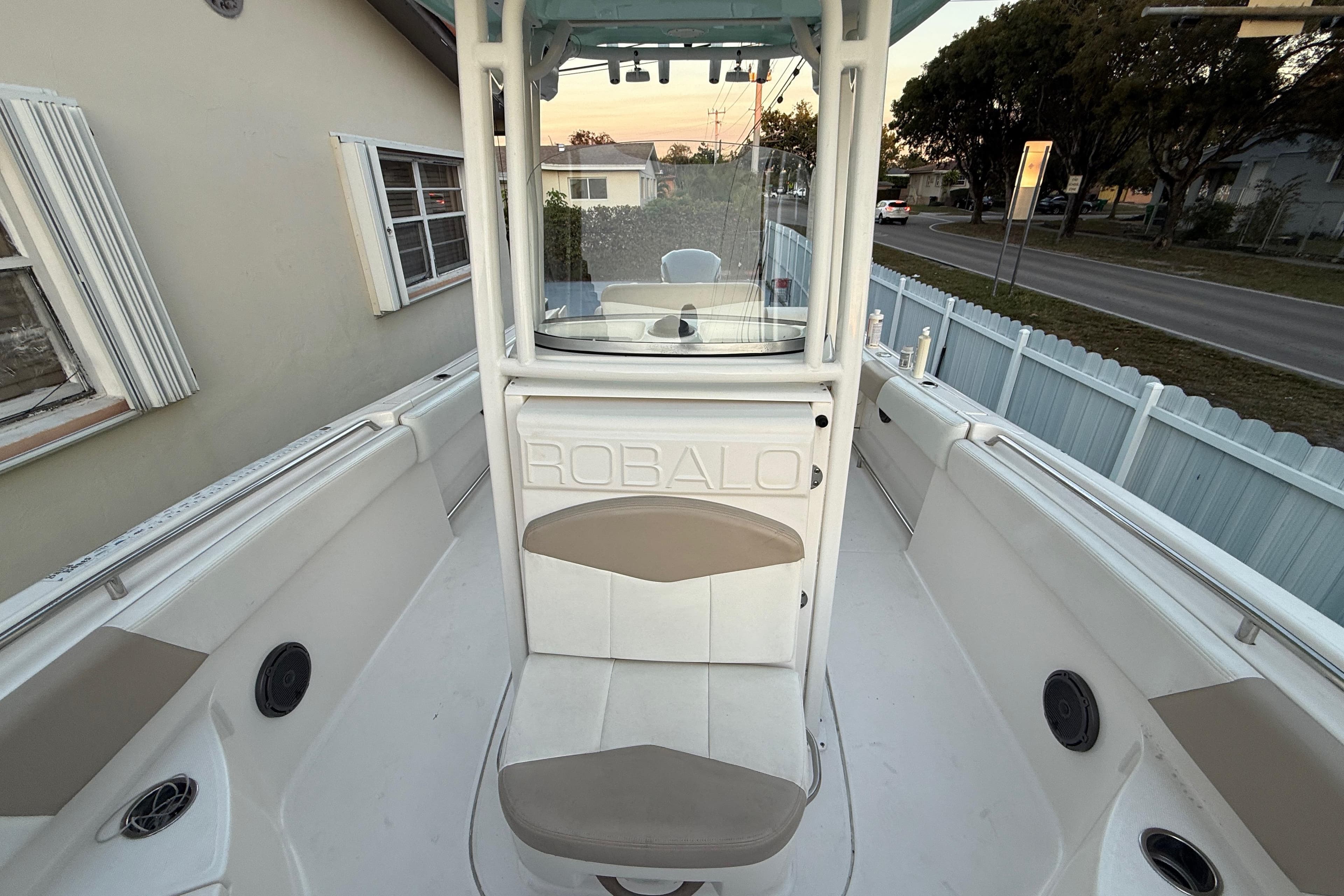 2018 Robalo R242 Center Console boat interior with seating and console view.