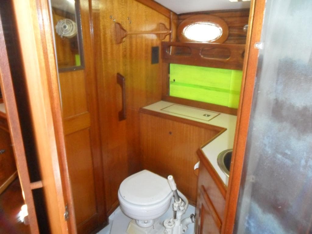 Interior of a 1976 Ericson 36C yacht with wooden fittings.
