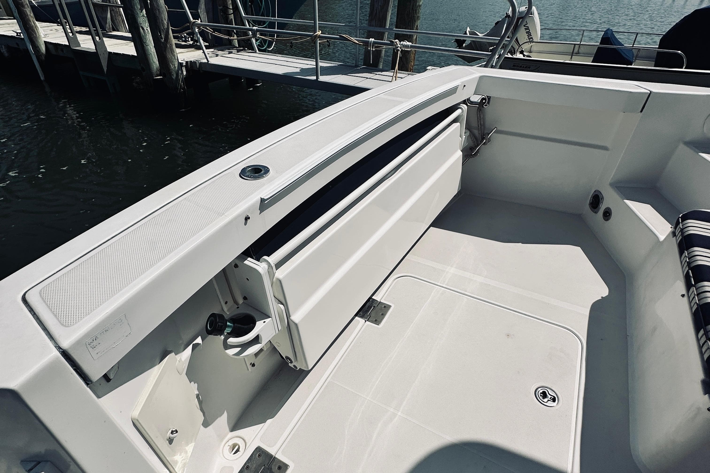 2007 Sabreline 34 Express boat deck with seating and dock view.