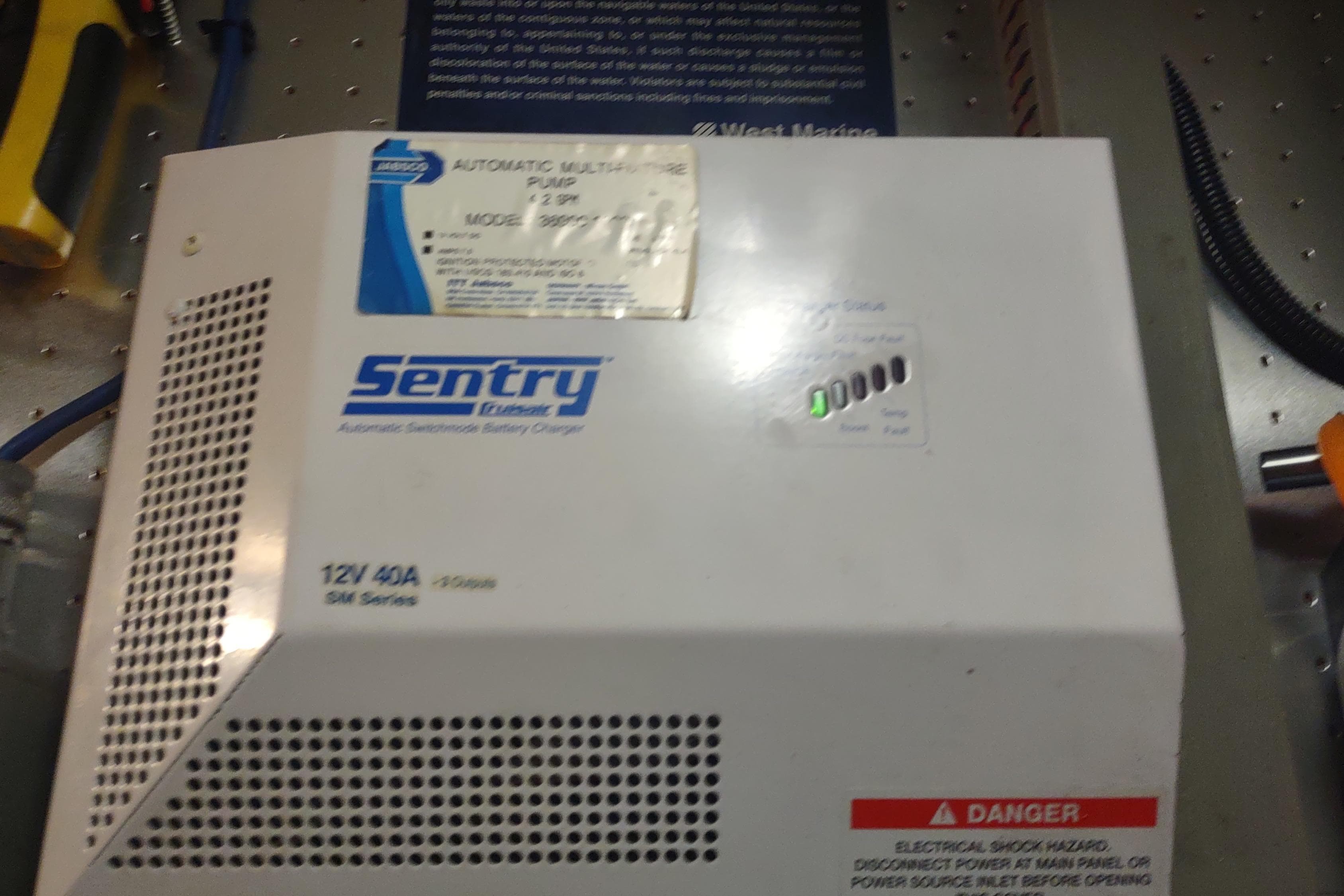 Sentry battery charger in a 2001 Kadey-Krogen 39 boat, model 12V 40A SM series.