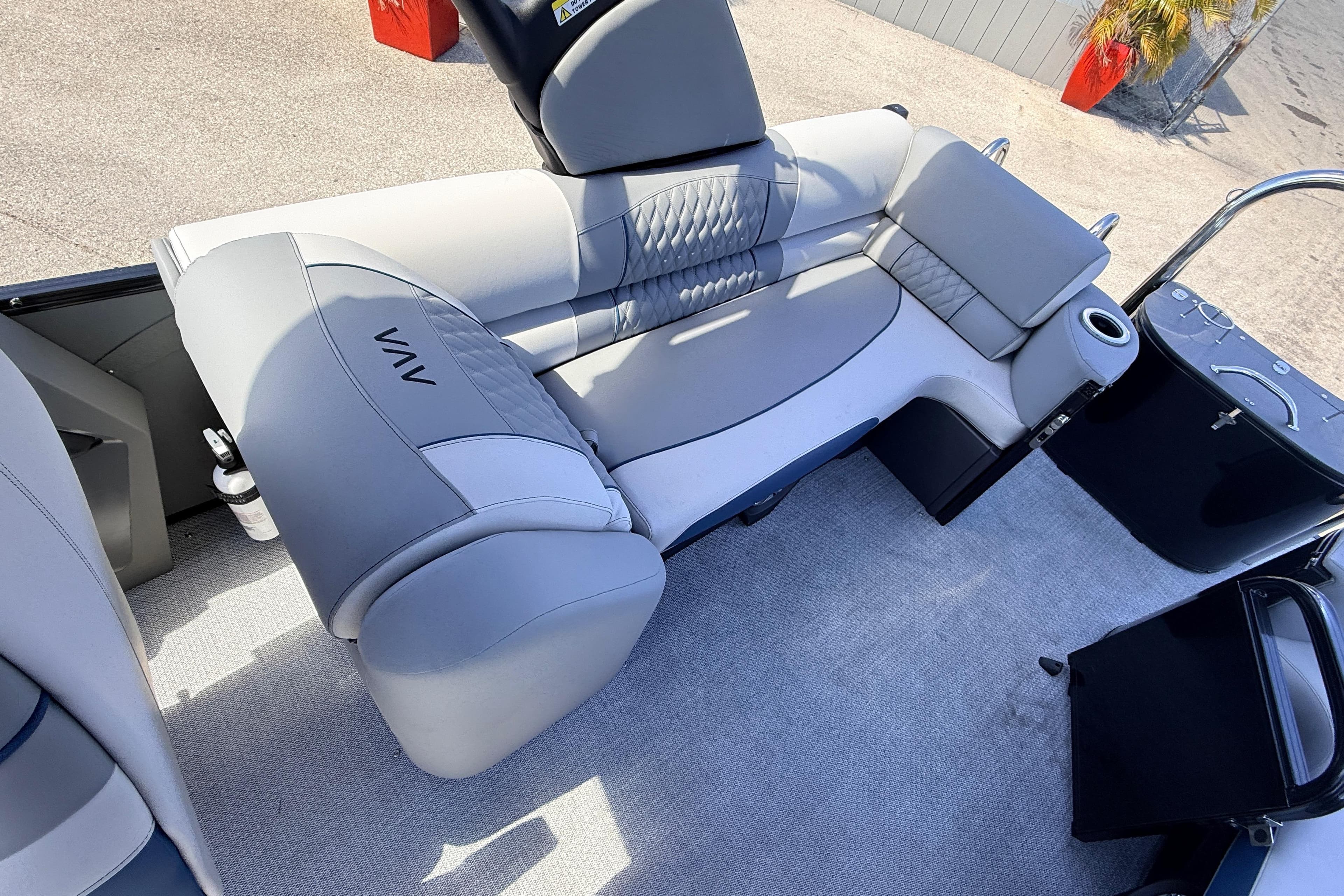 Luxurious seating on 2026 Avalon 2385 Catalina Quad Lounger, Tri Toon High Performance boat.