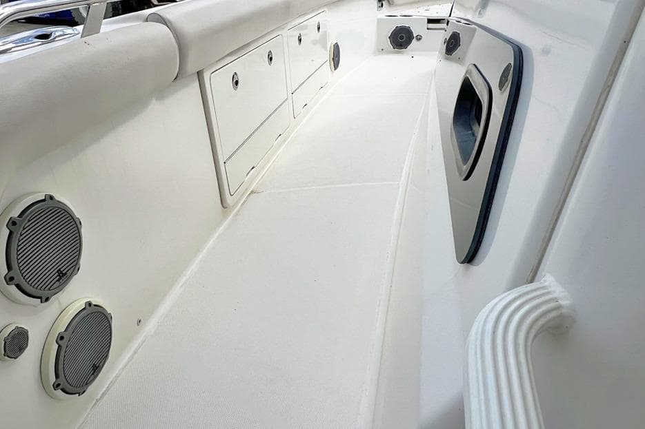 2018 Boston Whaler 420 Outrage interior with storage compartments and speakers.
