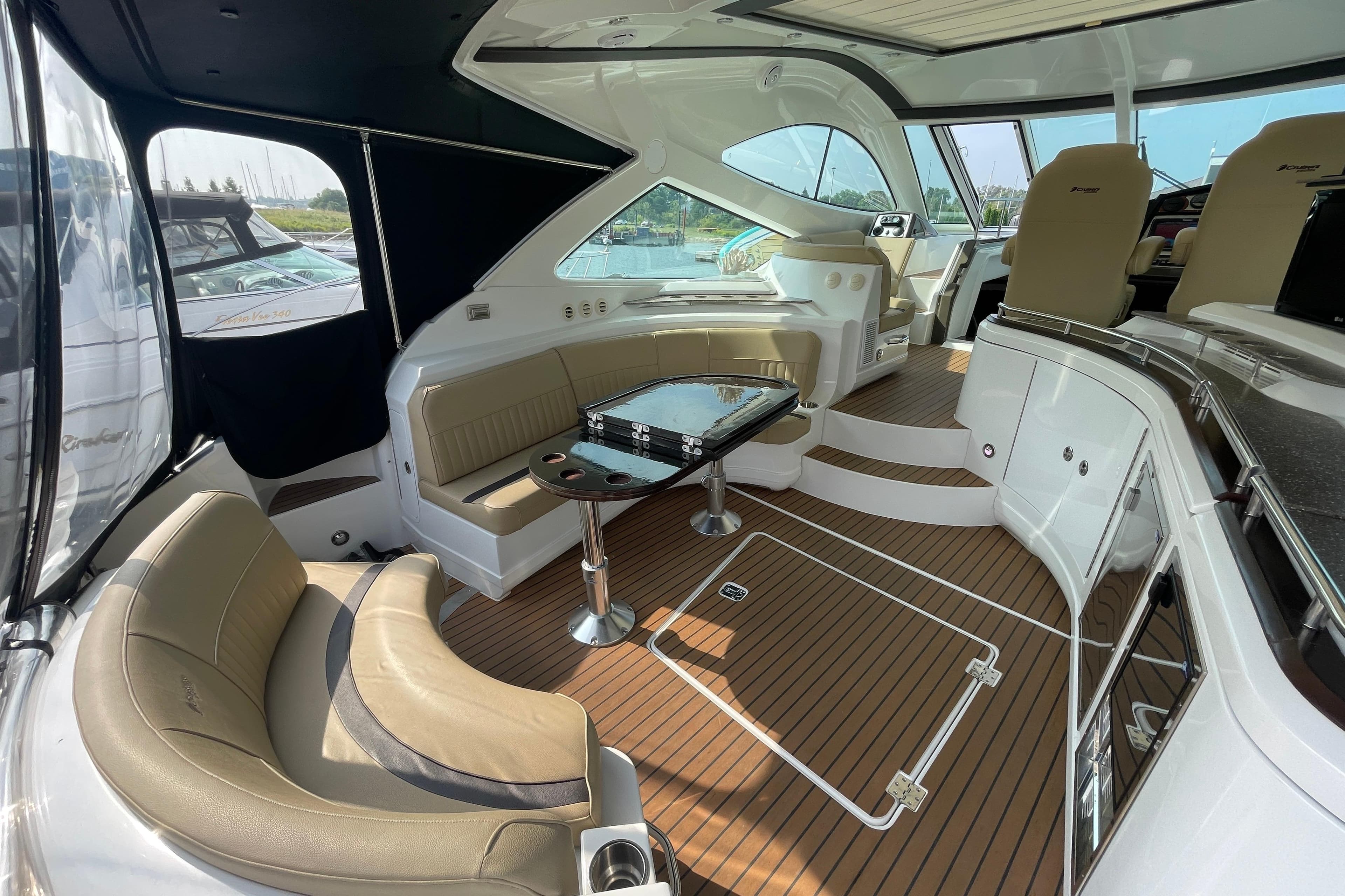 Luxurious interior of 2012 Cruisers Yachts 540 Sport Coupe with elegant seating and modern design.