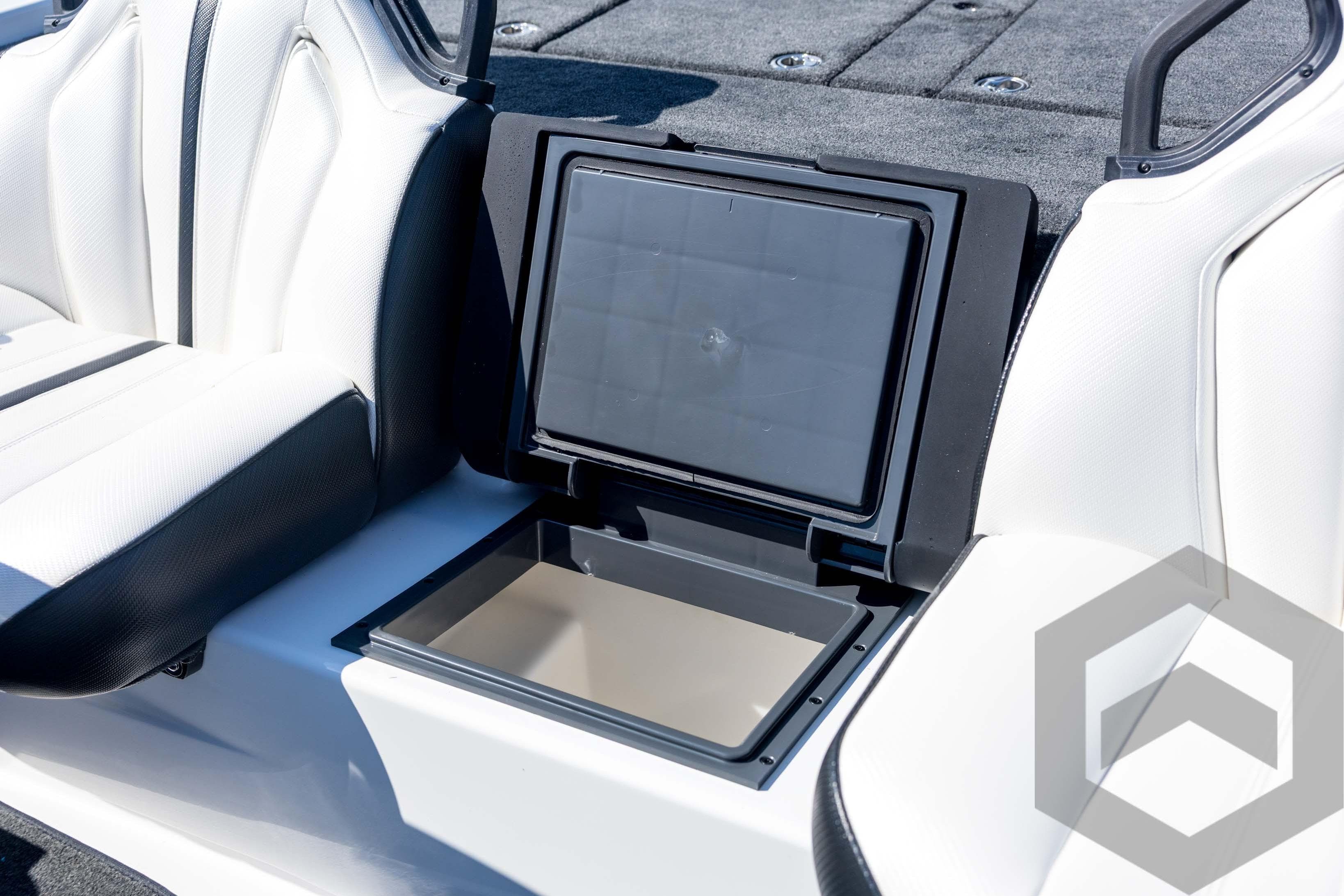 2026 Skeeter ZXE21 boat interior with open storage compartment and seating.