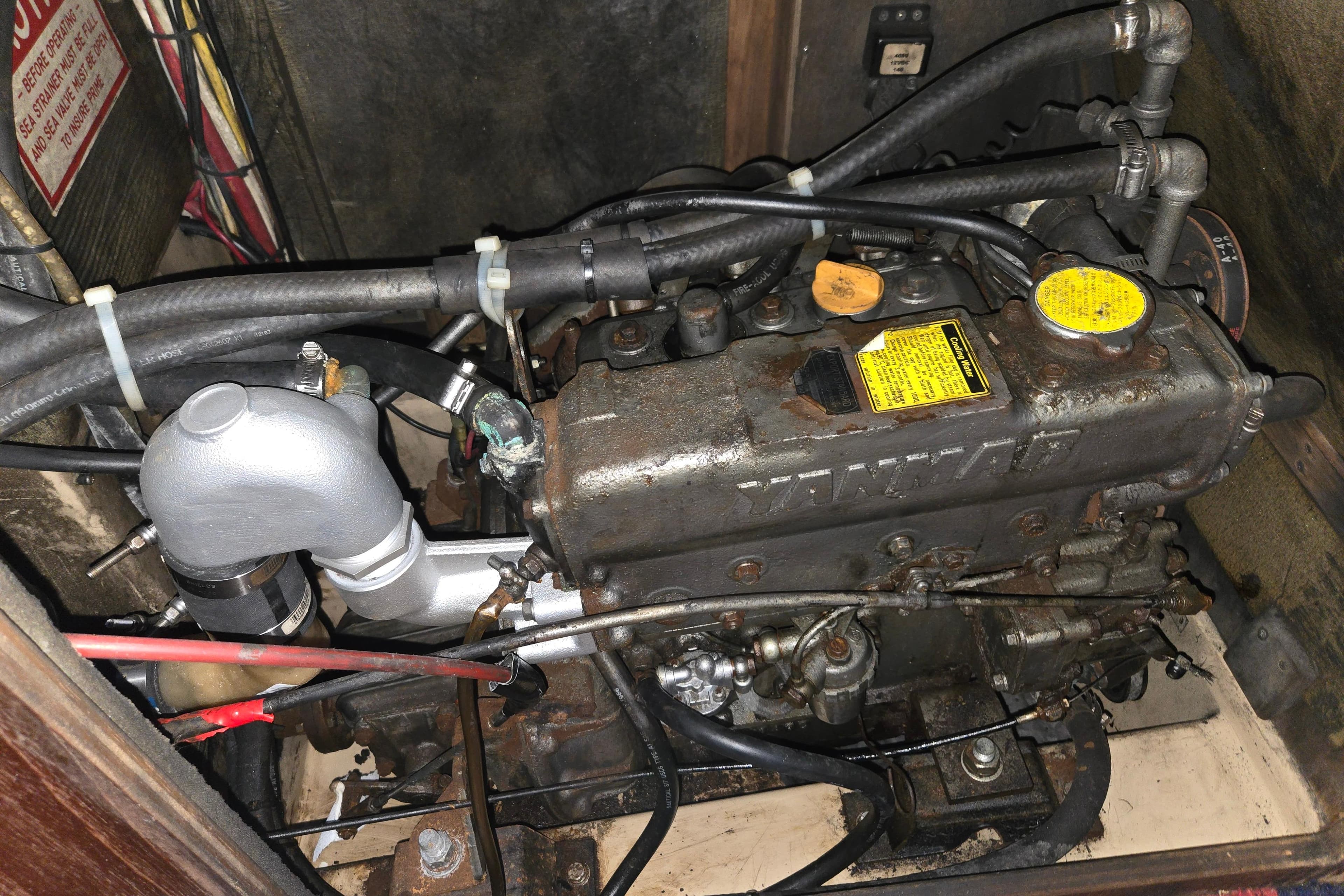 Engine of a 1989 Island Packet 35 sailboat, featuring Yanmar components.