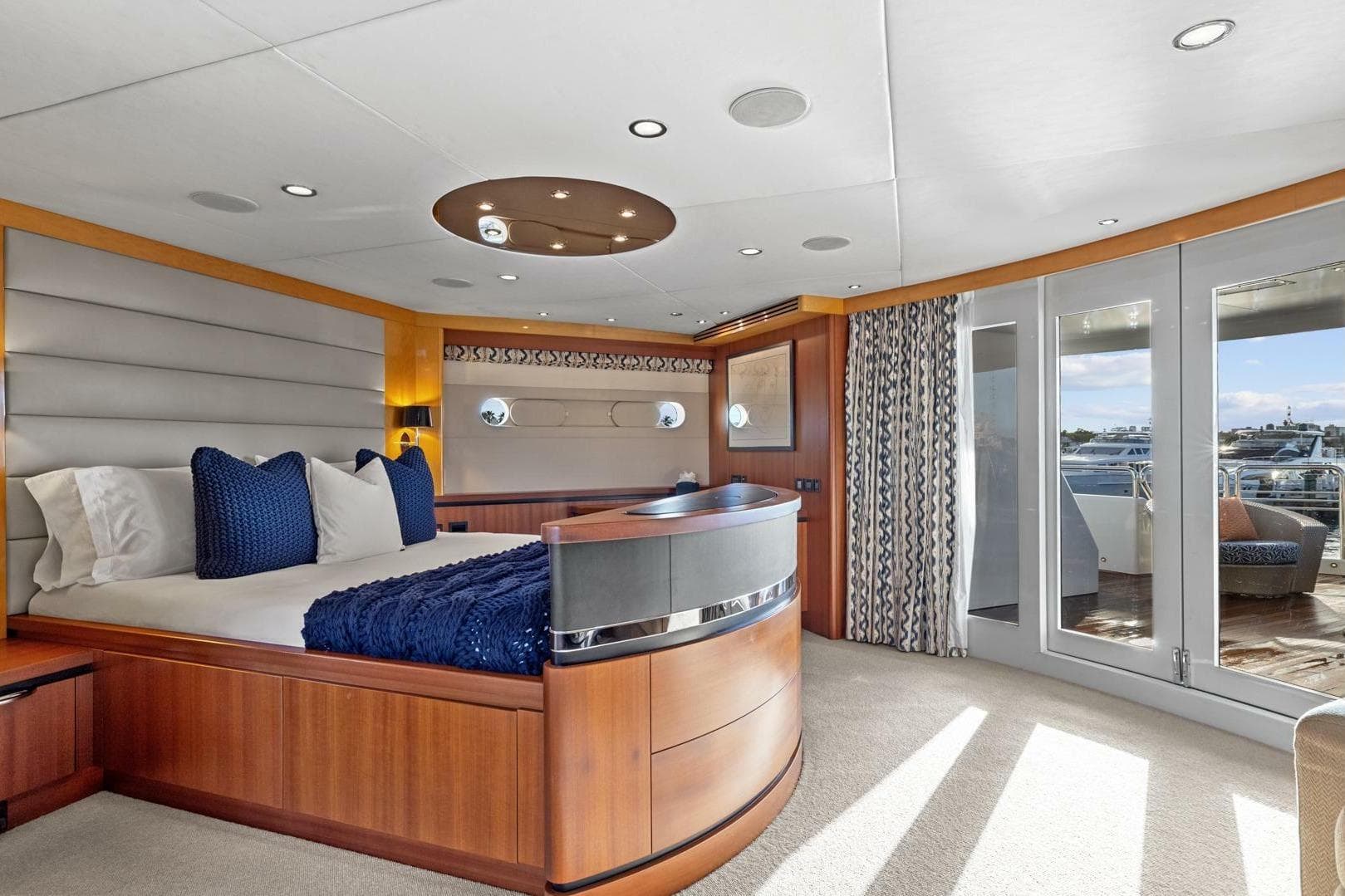 Luxurious bedroom interior of 2005 New Zealand Yachts 115 Wave Piercer with elegant decor.