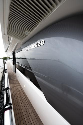 Sanlorenzo SL106 yacht, 2017 model, sleek design with wooden deck and modern finish.
