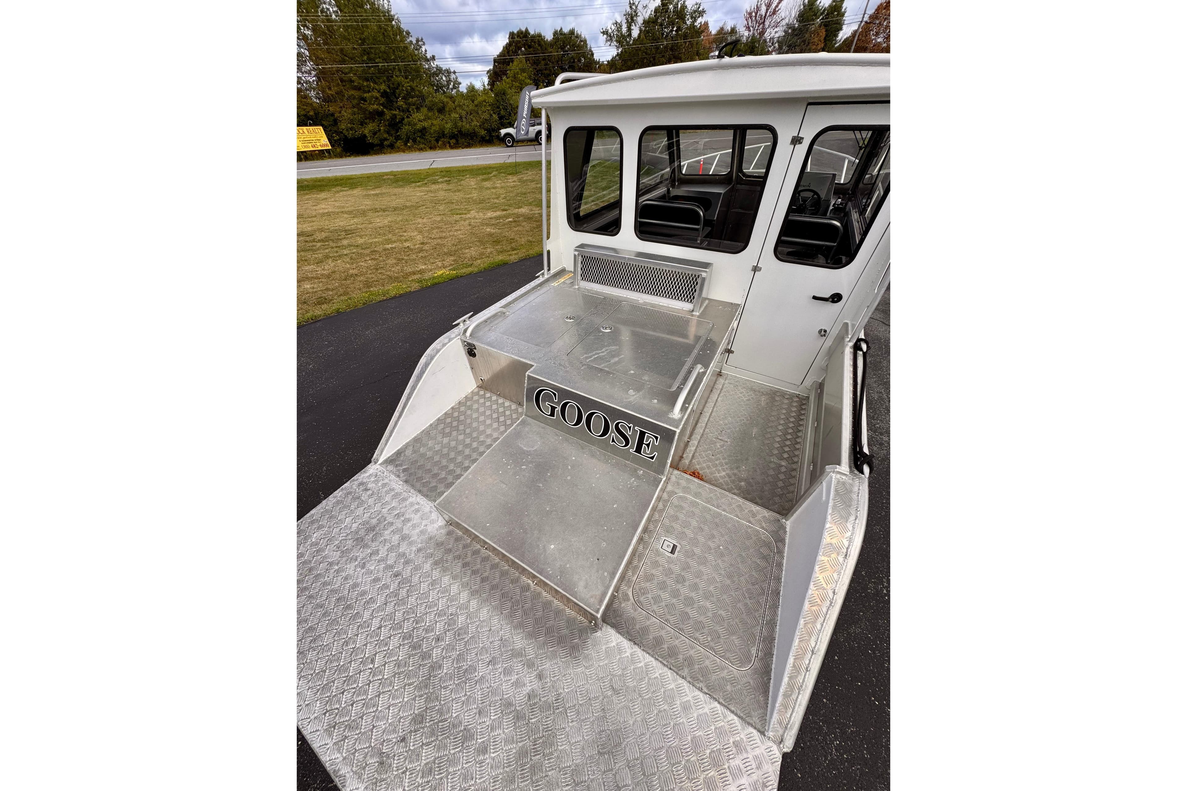 2018 Stanley 27 Custom boat with "Goose" label, featuring aluminum deck and cabin.