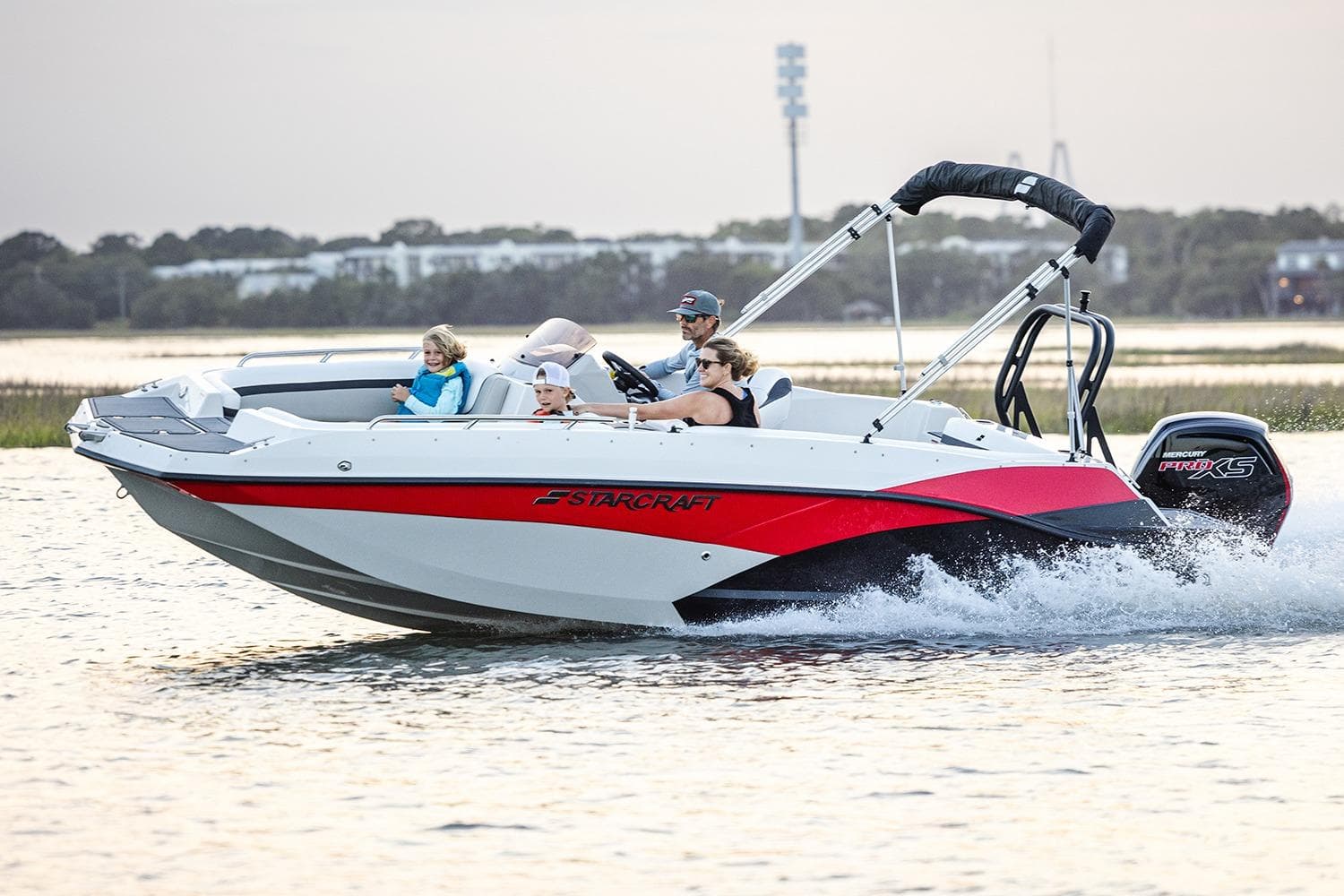 Manufacturer Provided Image: 2026 Starcraft SVX 191 OB boat cruising on water with passengers enjoying the ride.