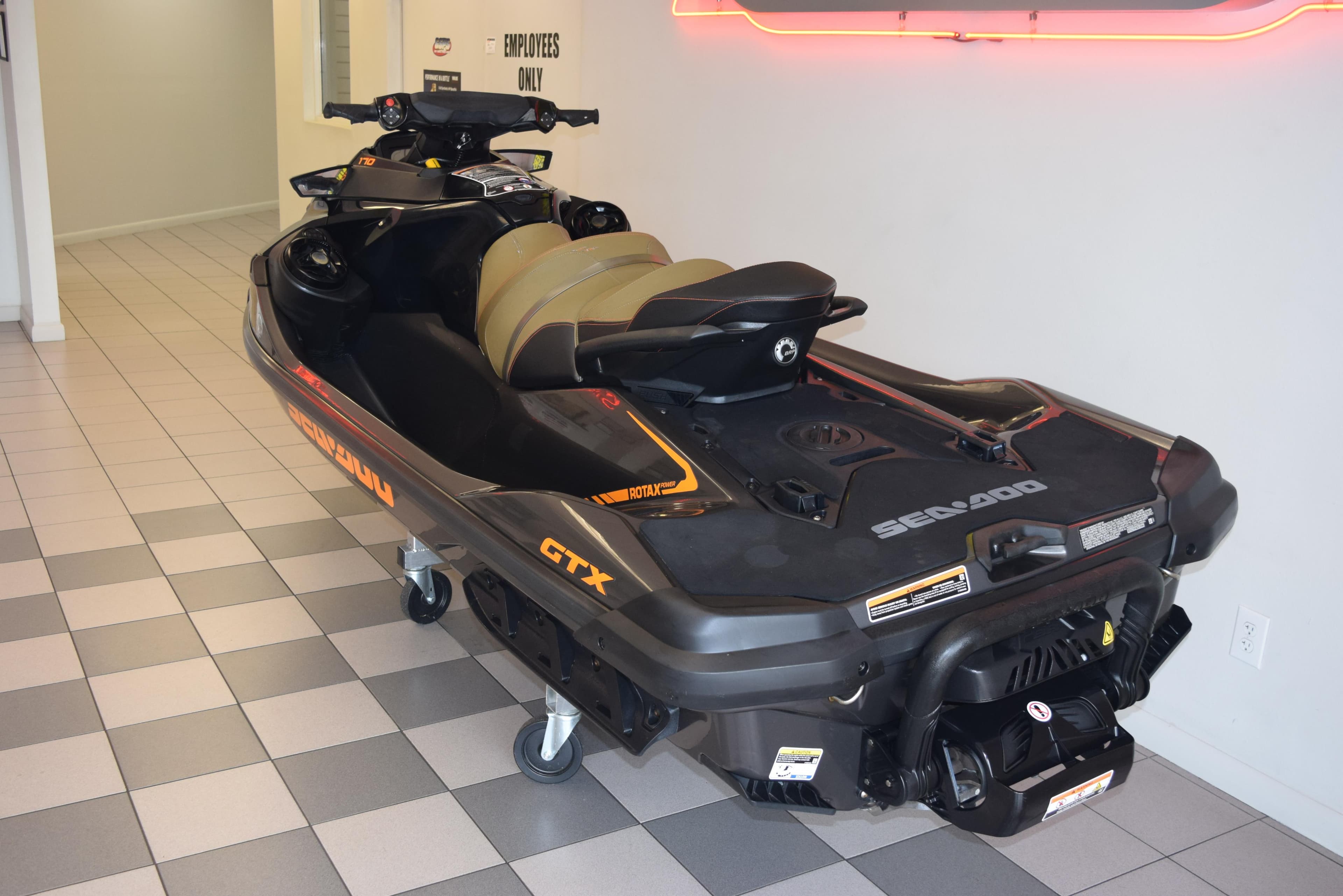 2021 Sea-Doo GTX 170 jet ski displayed indoors on tiled floor.