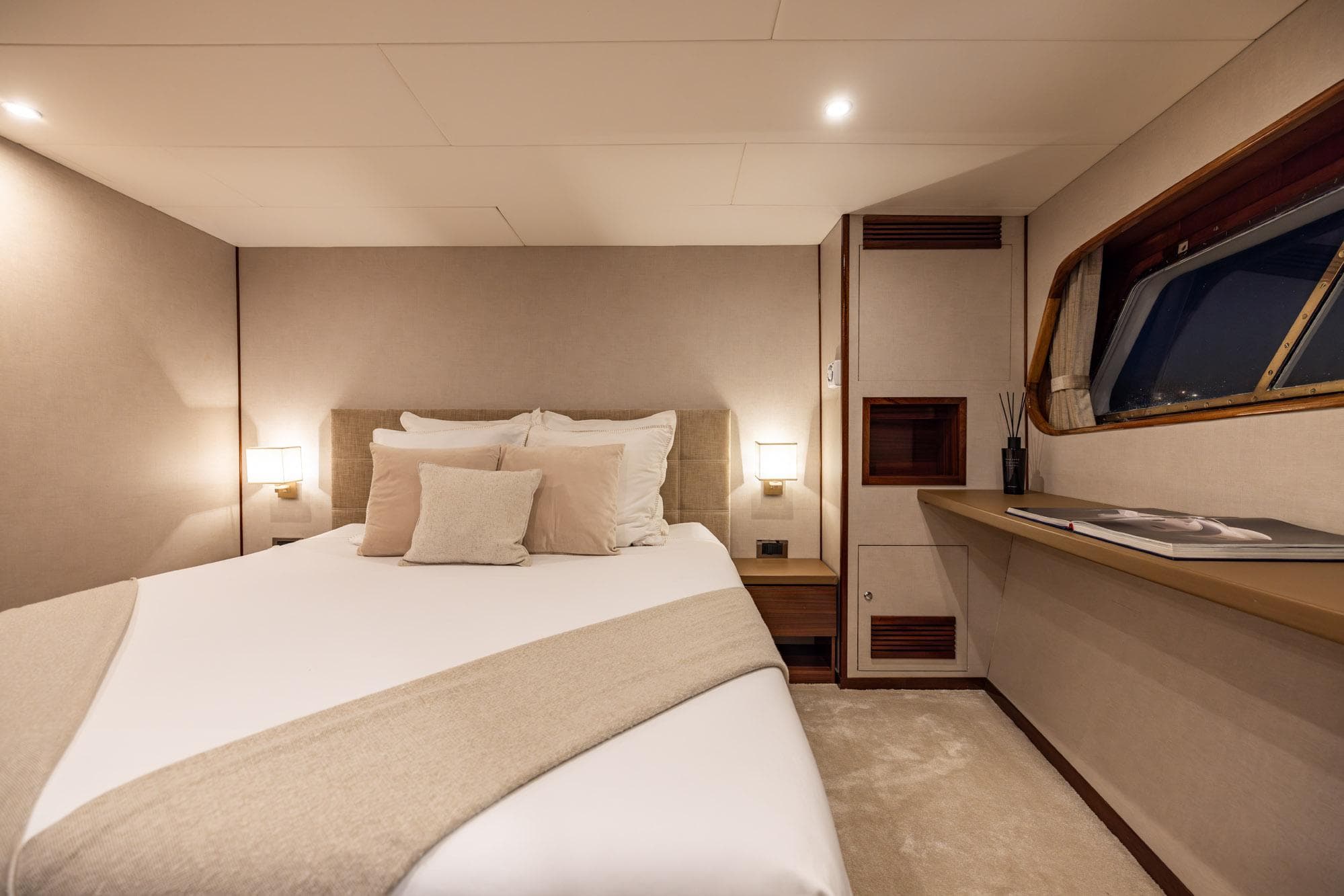 Luxurious bedroom interior on 1963 Feadship Classic Canoe Stern yacht.