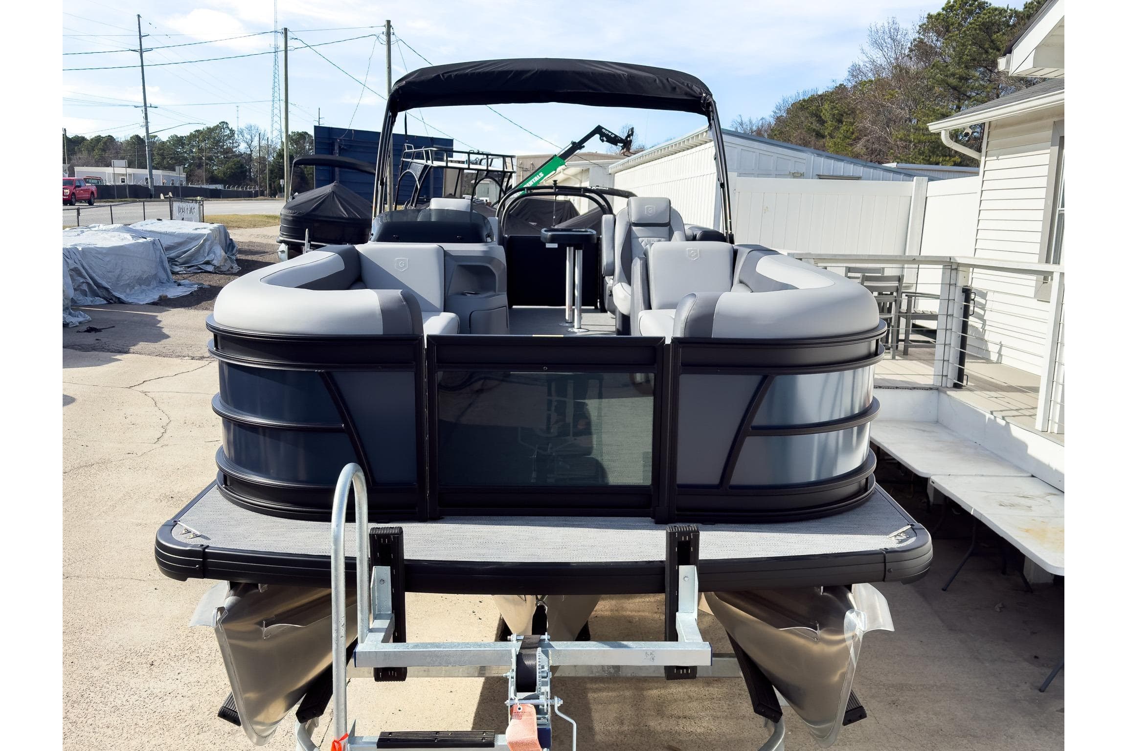 2026 Godfrey Sweetwater 22' Split Bench Tritoon, model 2286 SBC, parked on trailer.