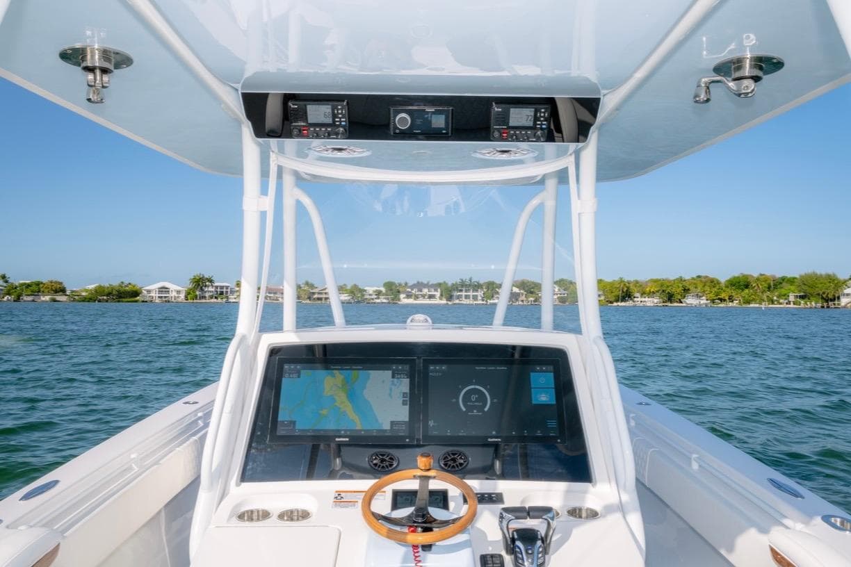 2026 Contender 39 ST boat dashboard with navigation display on open water.