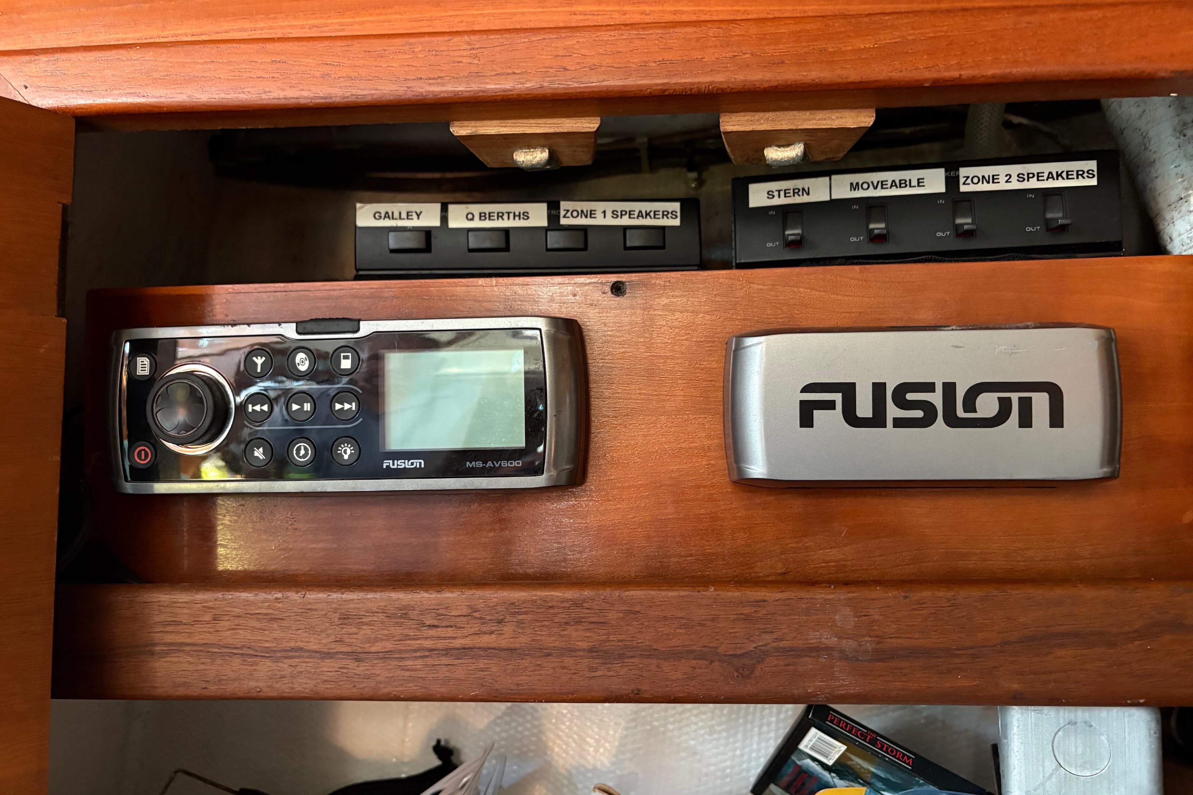 Control panel and Fusion stereo system in 1981 Aztec Nautilus 40 boat interior.