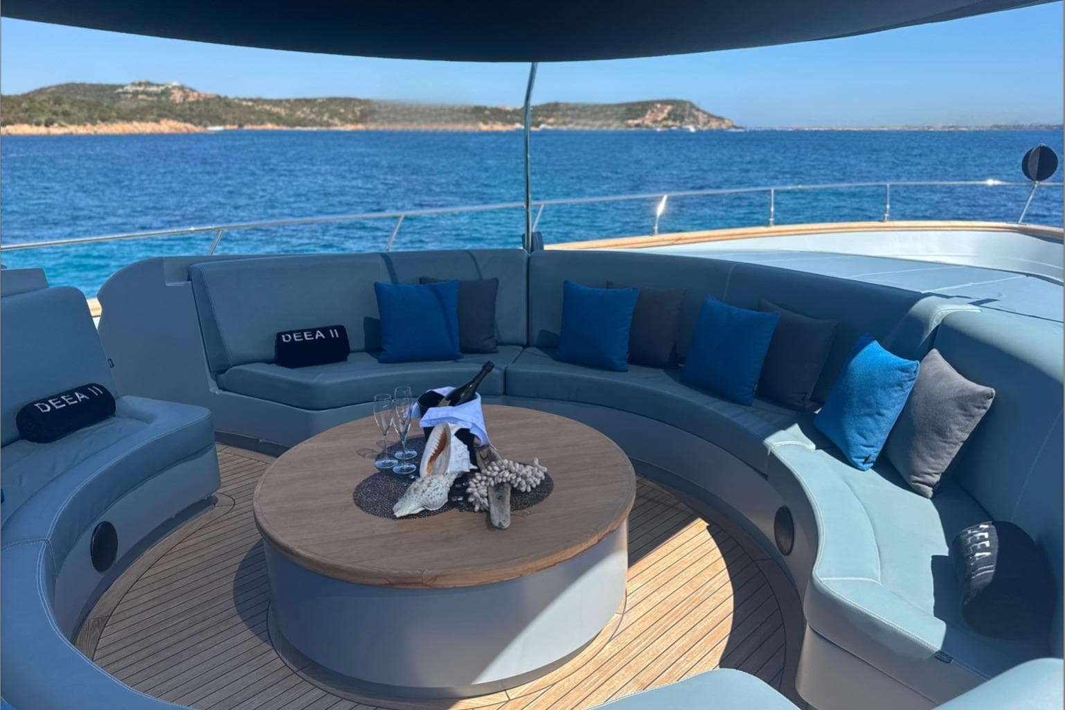 Luxurious seating area on 2009 Cerri Cantieri Navali 102 yacht with ocean view.