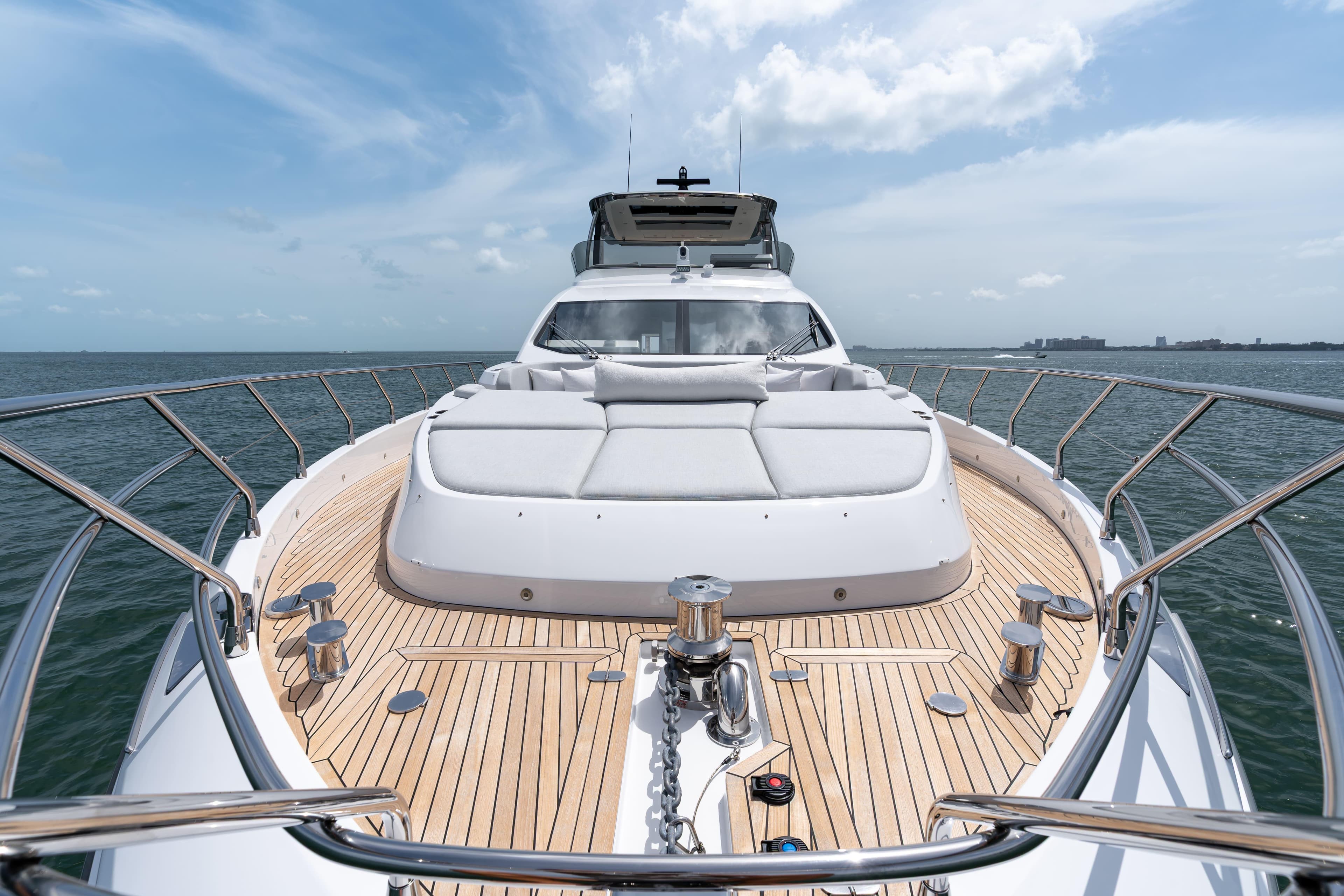 Luxurious 2022 Azimut 78 yacht with spacious deck and elegant design on open water.