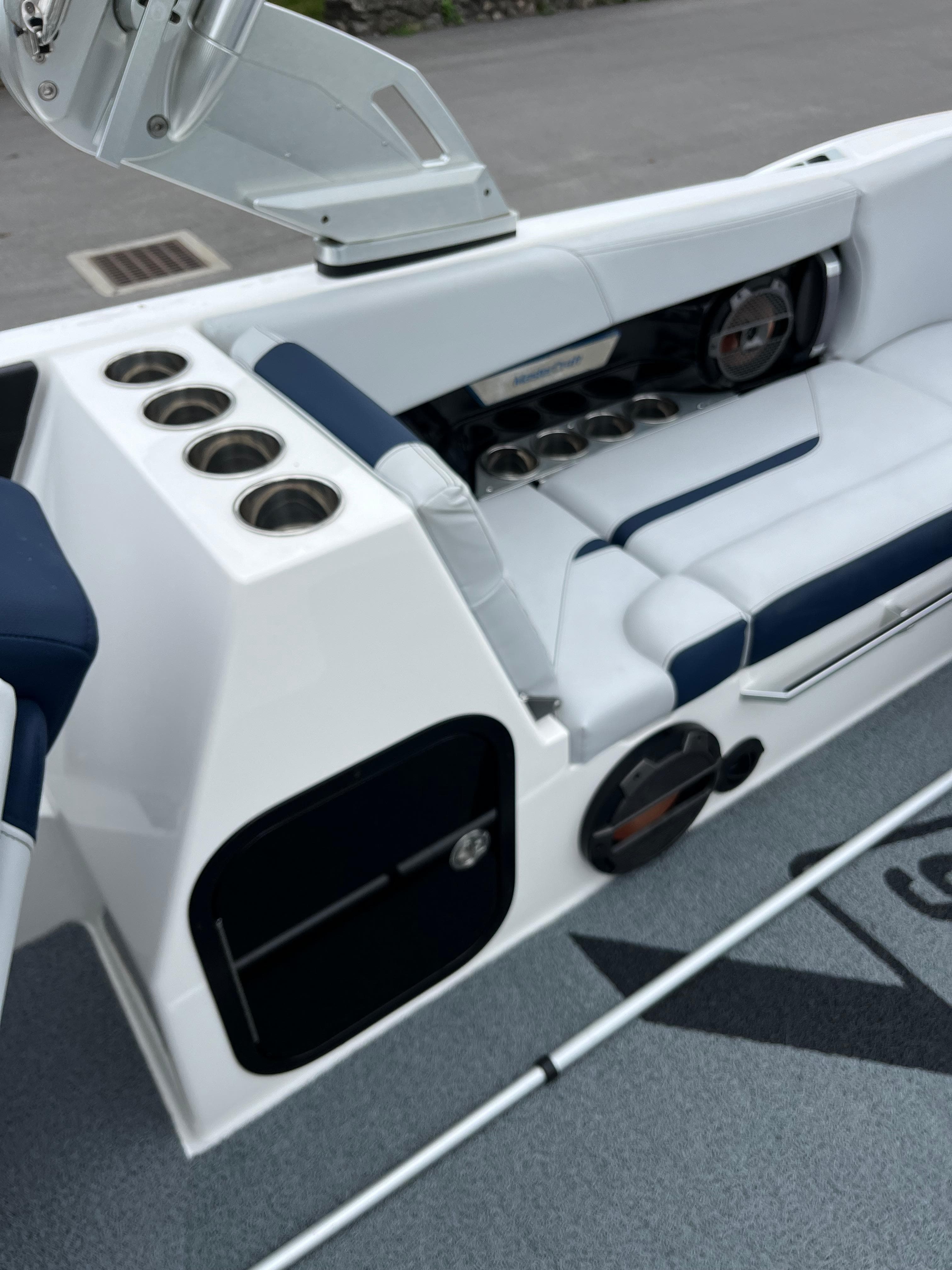 2019 MasterCraft X26 boat interior with cup holders and seating.
