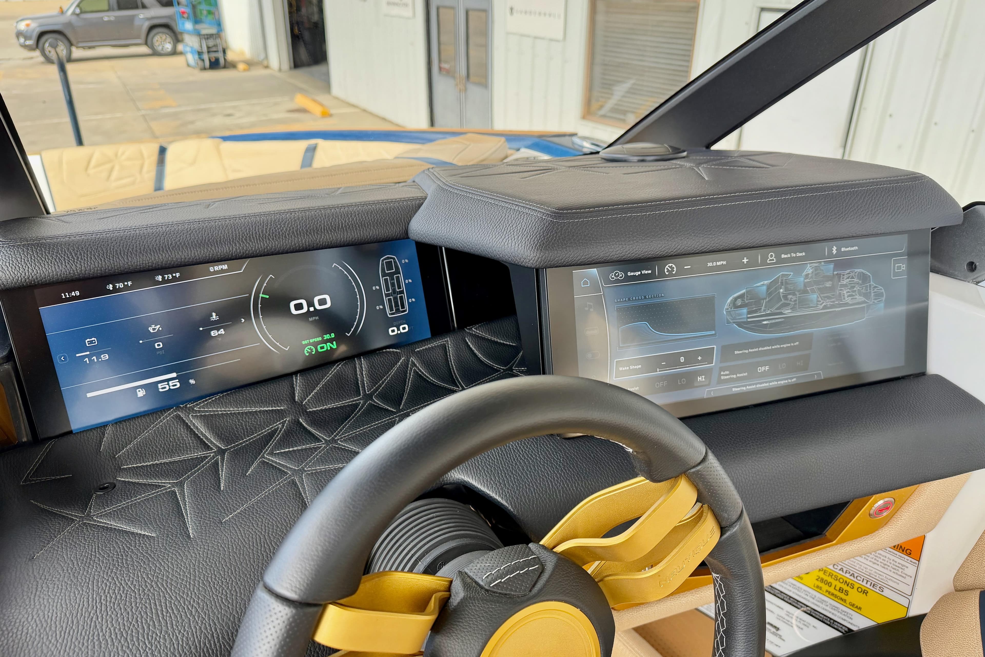 2025 Nautique Super Air Nautique G25 Paragon dashboard with dual digital displays.