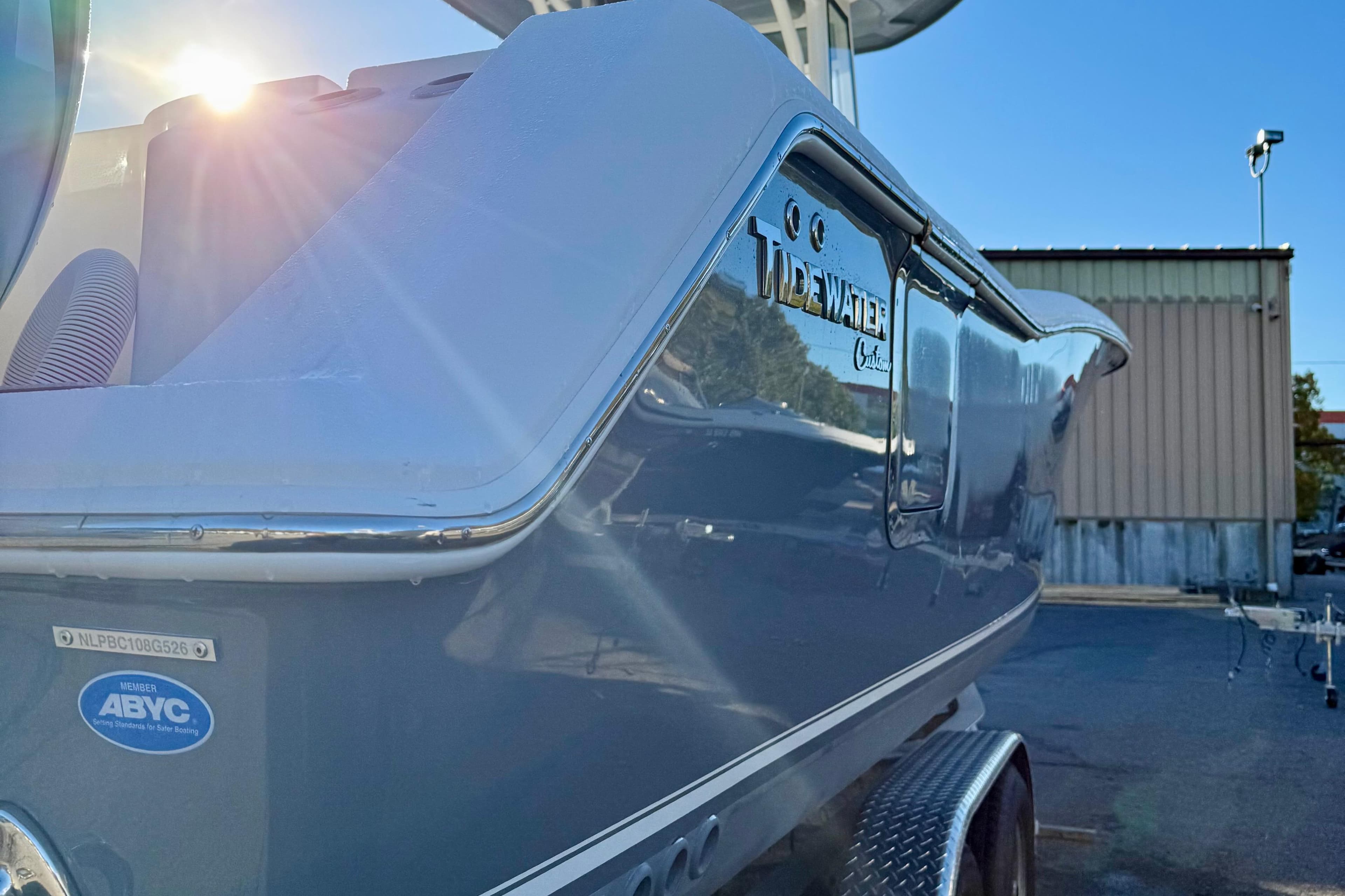 2026 Tidewater 282 CC Adventure boat with sunlit hull and ABYC certification.