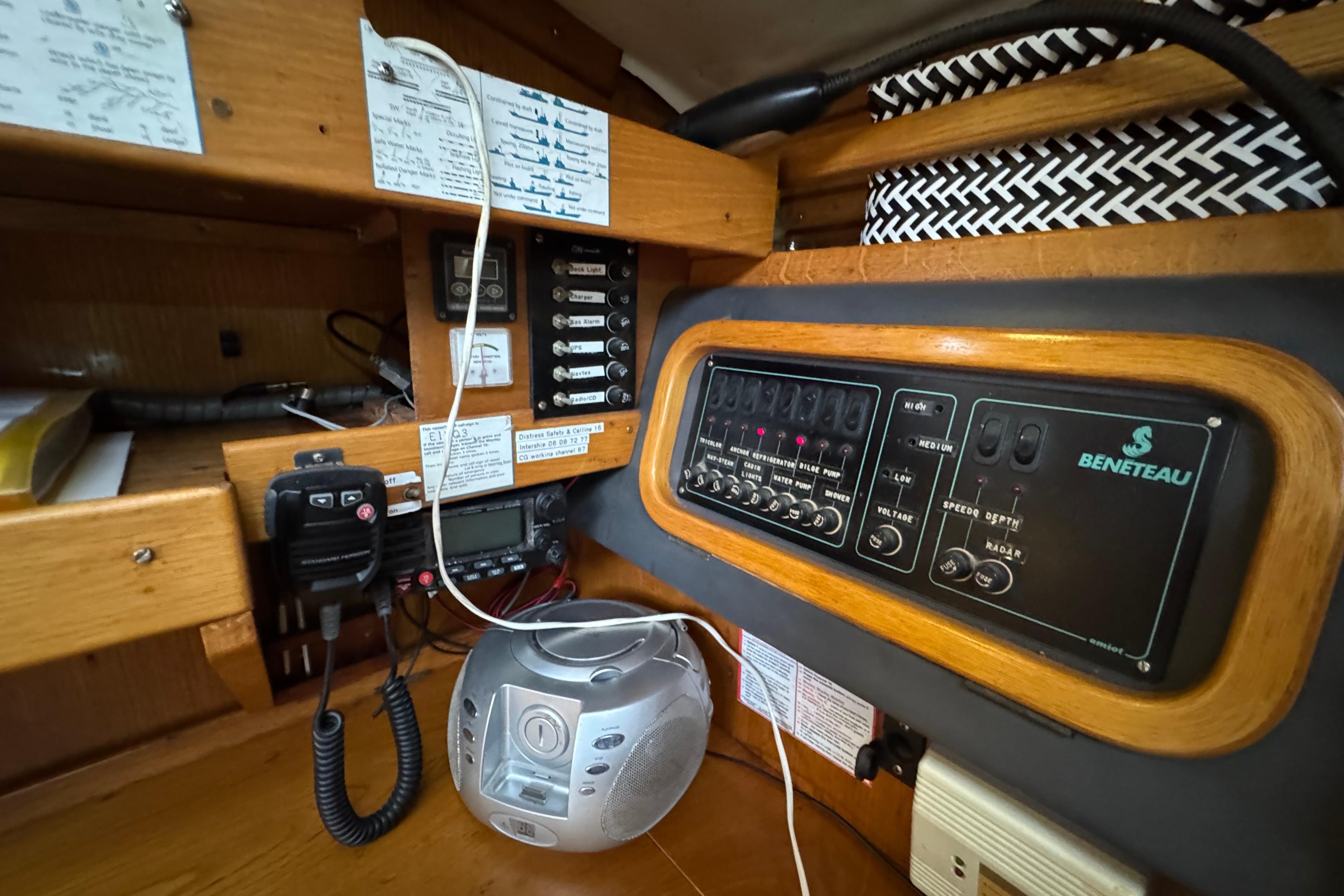 Control panel of a 1988 Beneteau Oceanis 390 sailboat with navigation equipment.