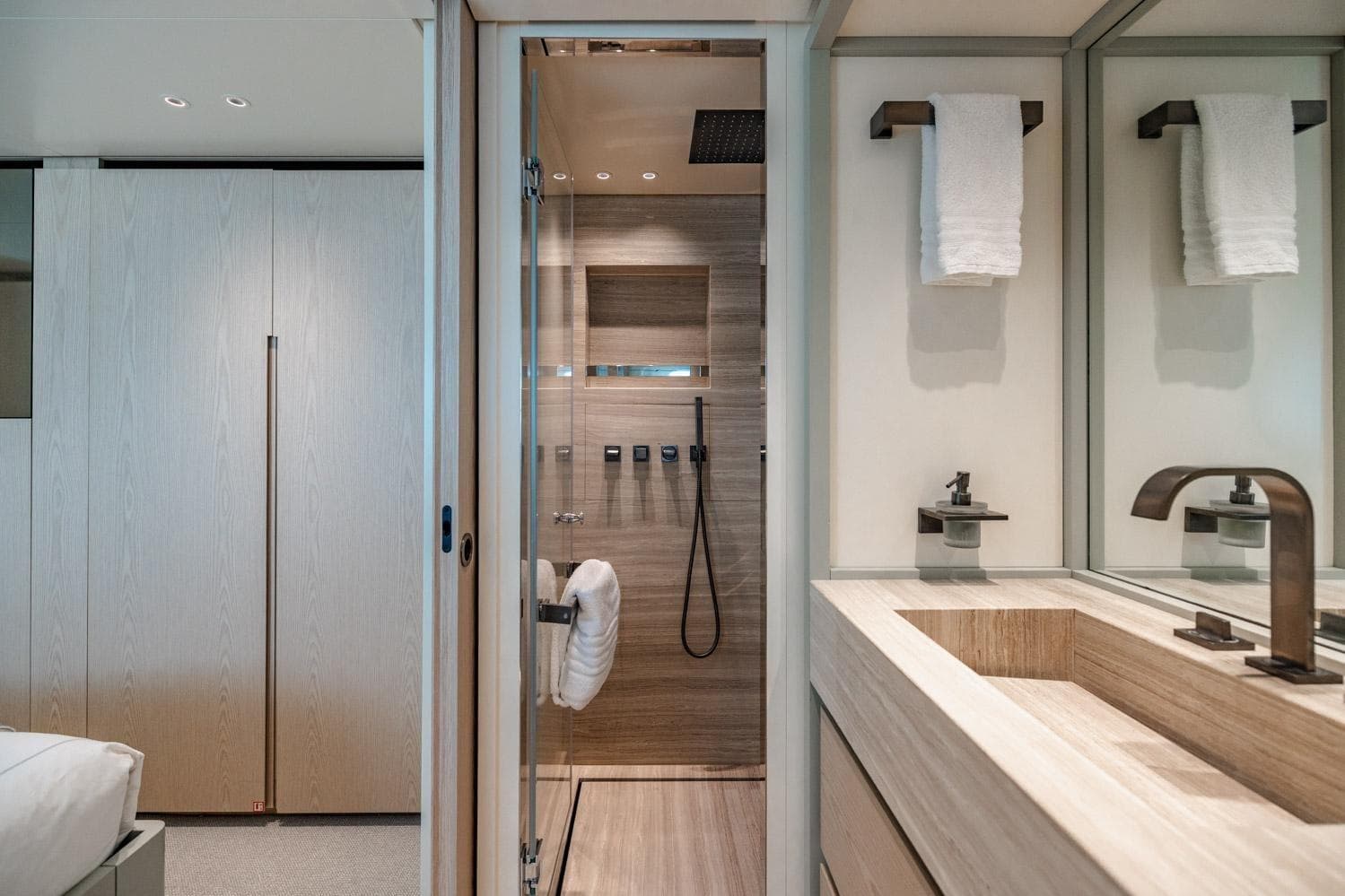 Luxurious bathroom interior of 2022 Sanlorenzo SD96 yacht, featuring modern design and elegant fixtures.
