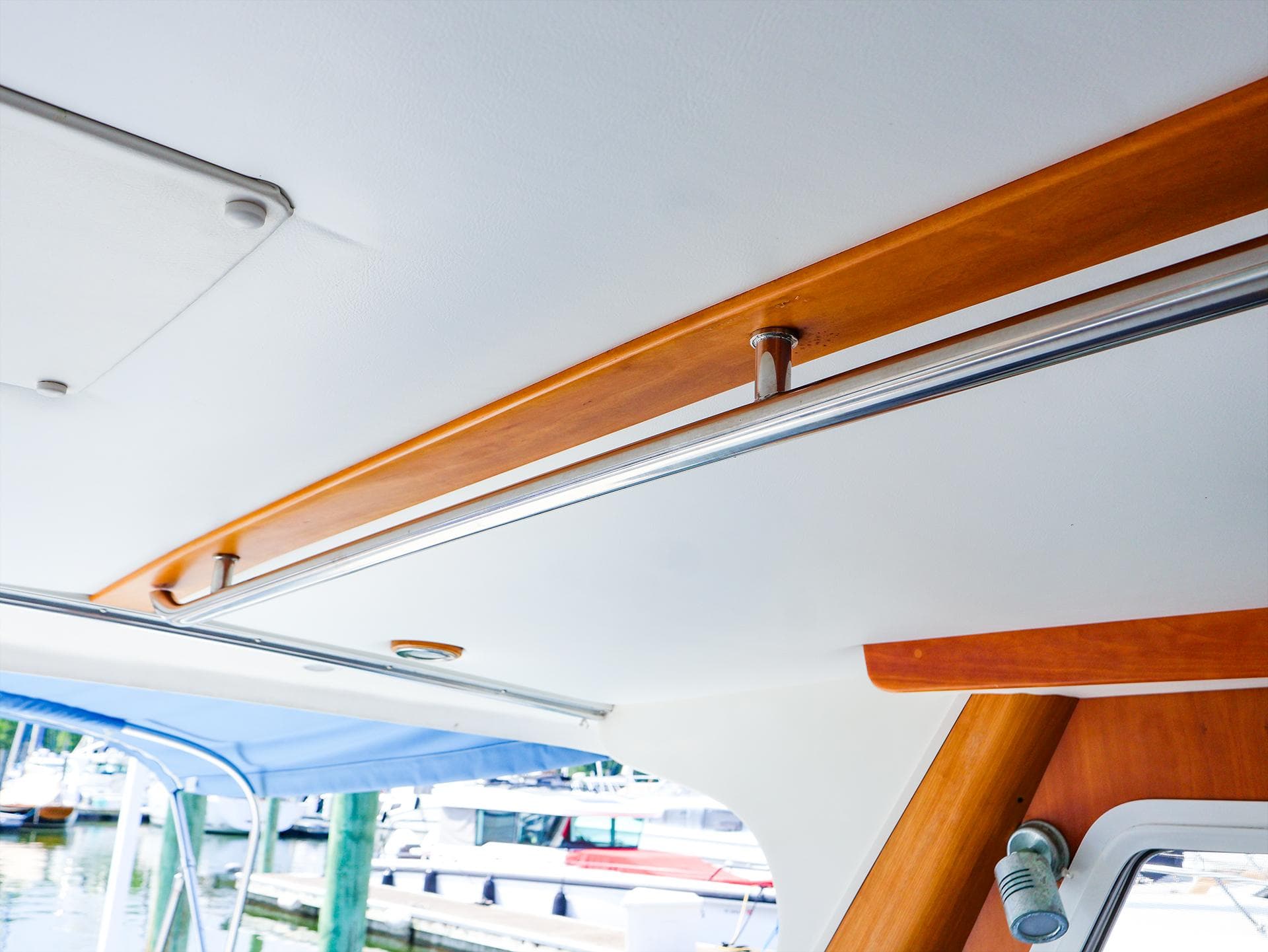 Interior view of 2004 True North 38 boat with wooden and metal ceiling details.