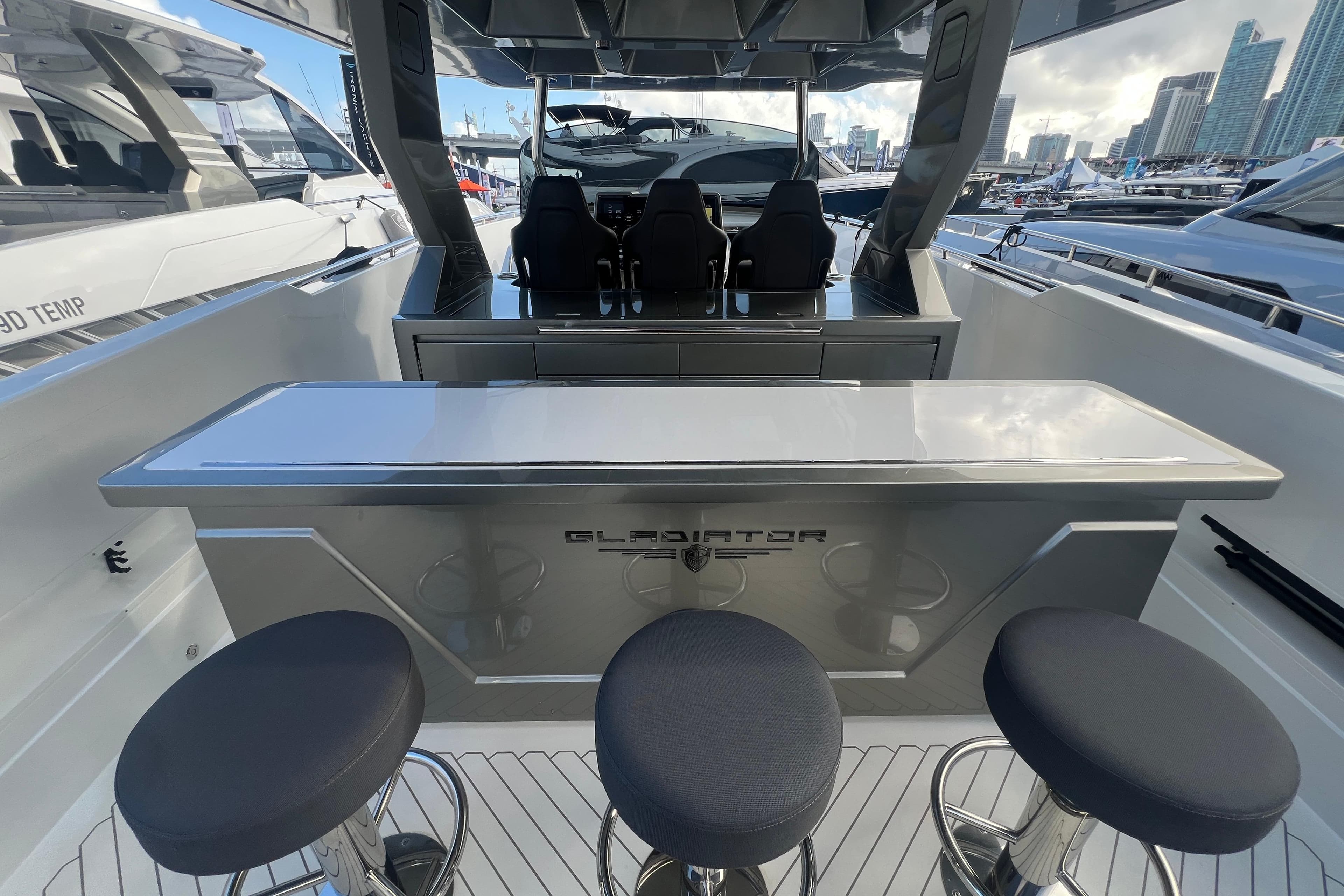 2023 Canados 493 Gladiator yacht interior with sleek bar and seating.
