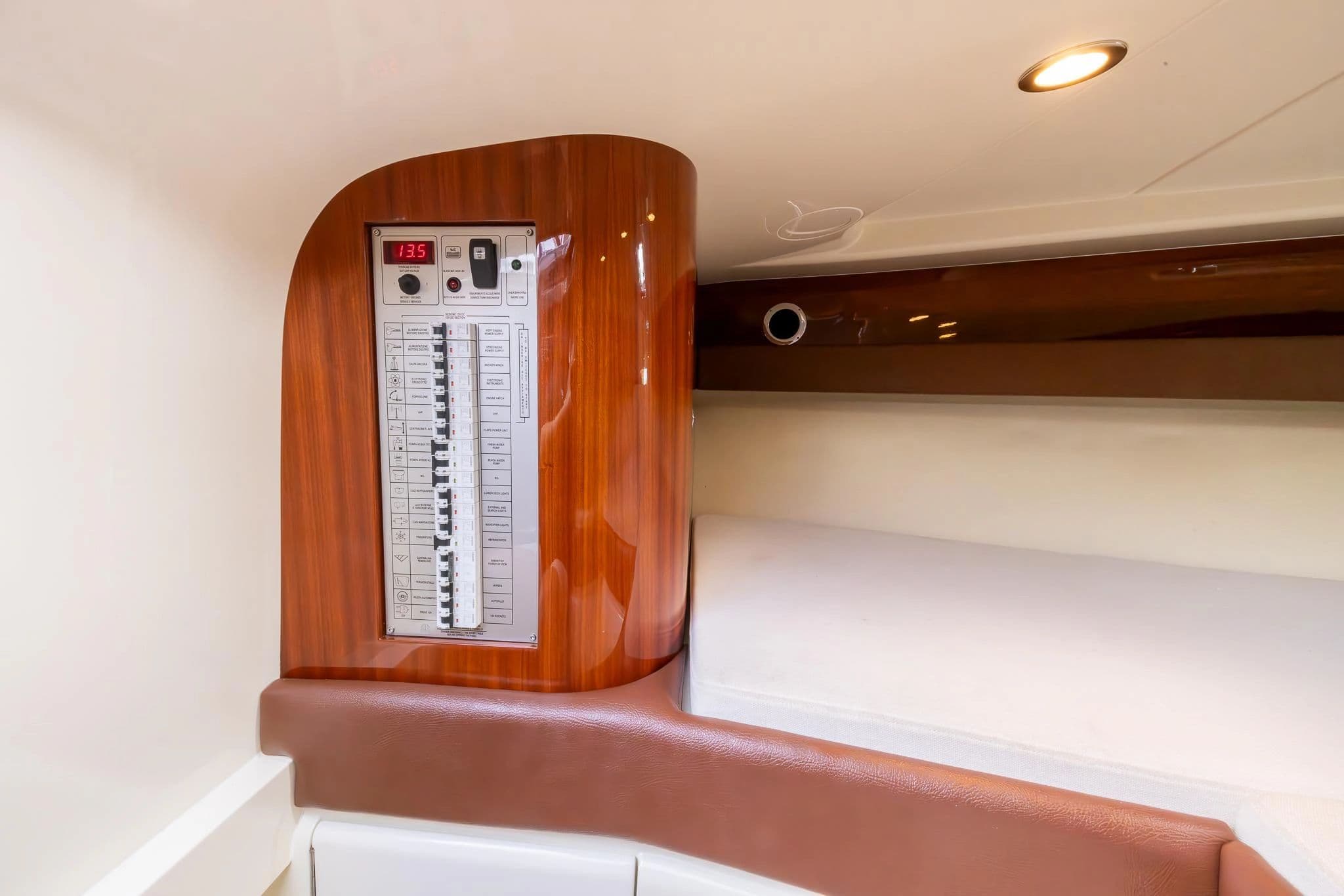 Interior view of 2013 Riva 33' Aquariva Super with control panel.
