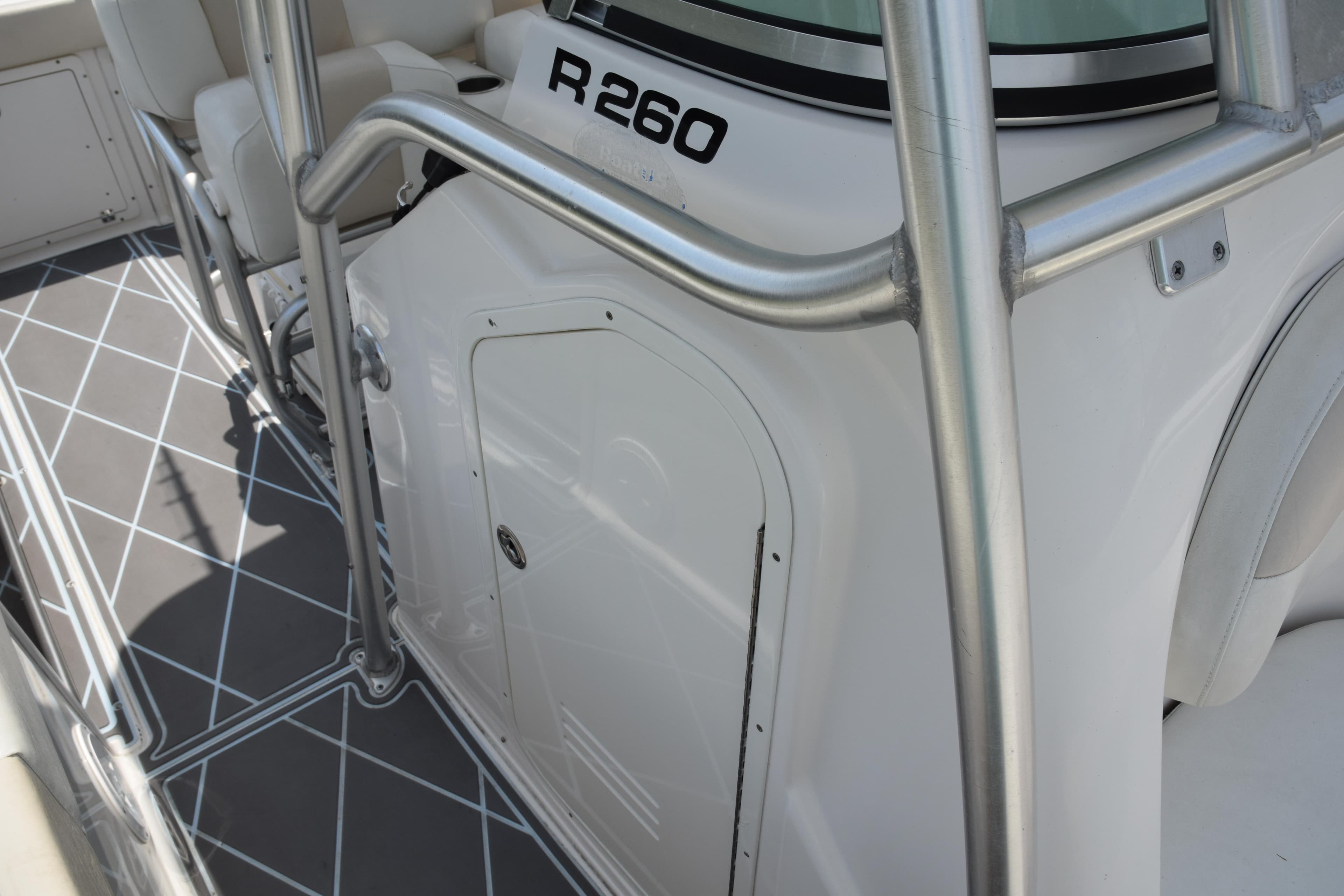 2006 Robalo R260 Center Console boat interior with stainless steel railings.