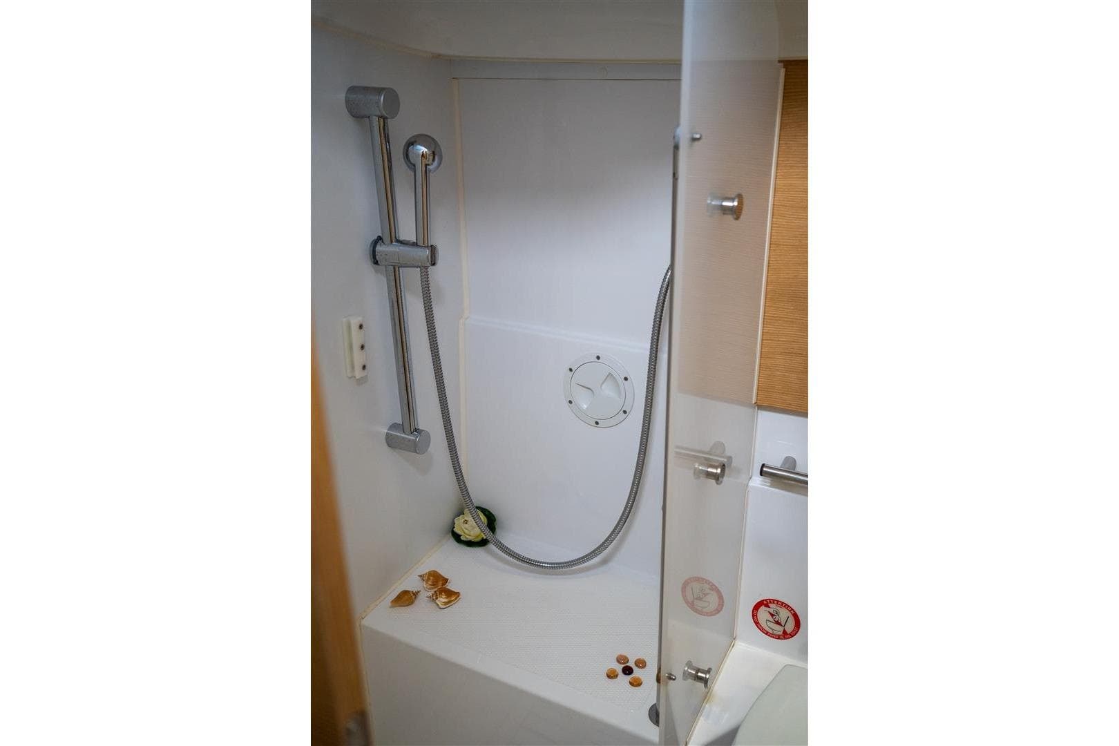 Shower area in 2015 Elan Impression 45 yacht, featuring modern fixtures and sleek design.