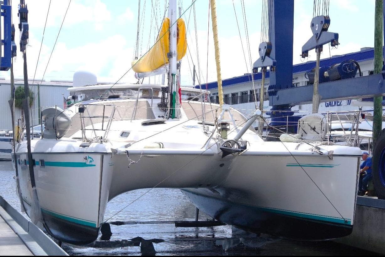 2004 Privilege 49 catamaran in dry dock, undergoing maintenance.