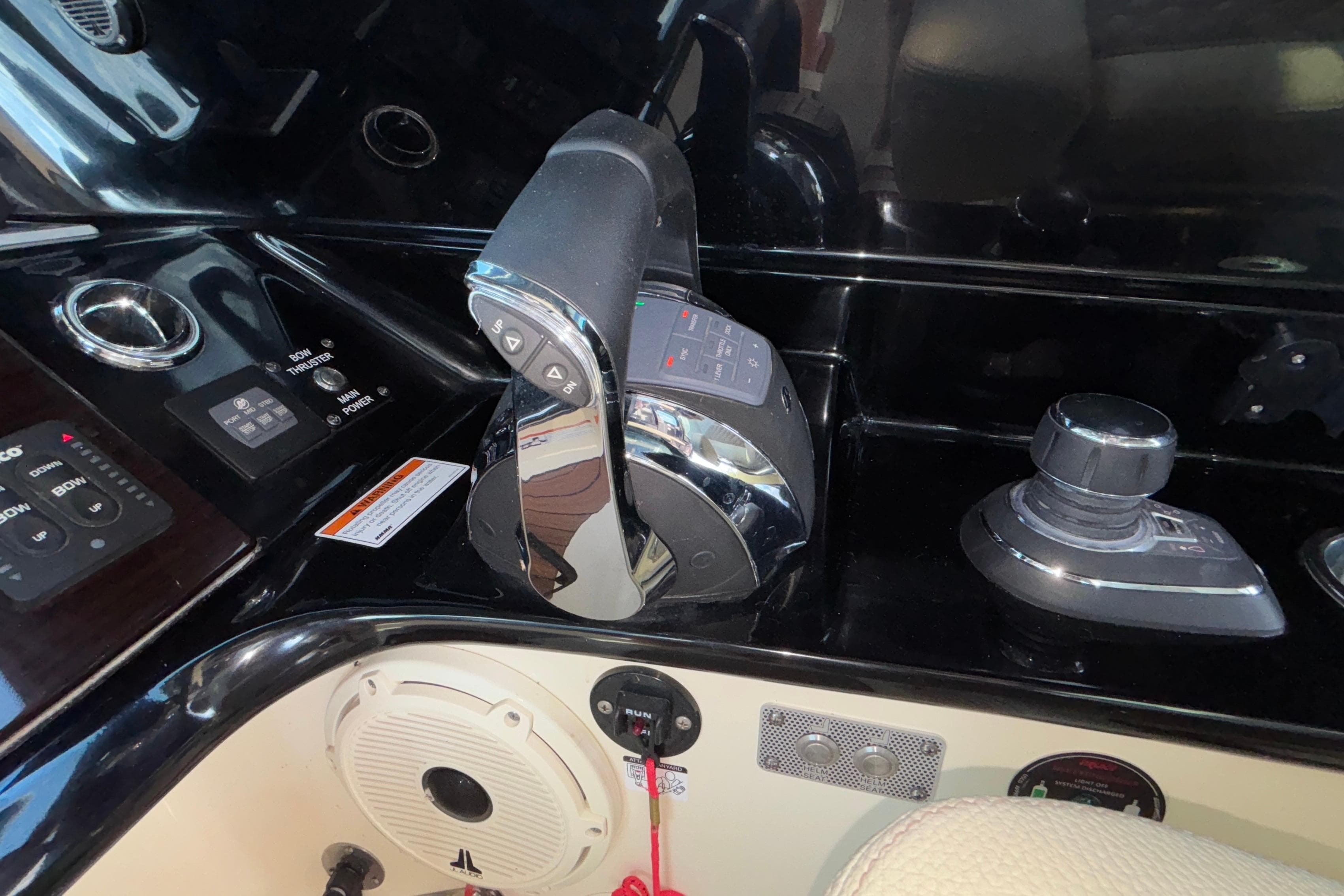 Control panel of 2021 Chris-Craft Calypso 35 boat with throttle and joystick.