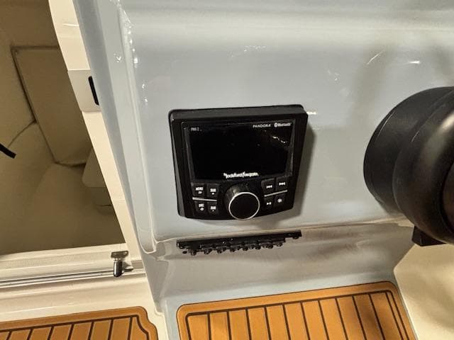 Control panel on 2025 Bayliner T22 SC boat with Rockford Fosgate audio system.