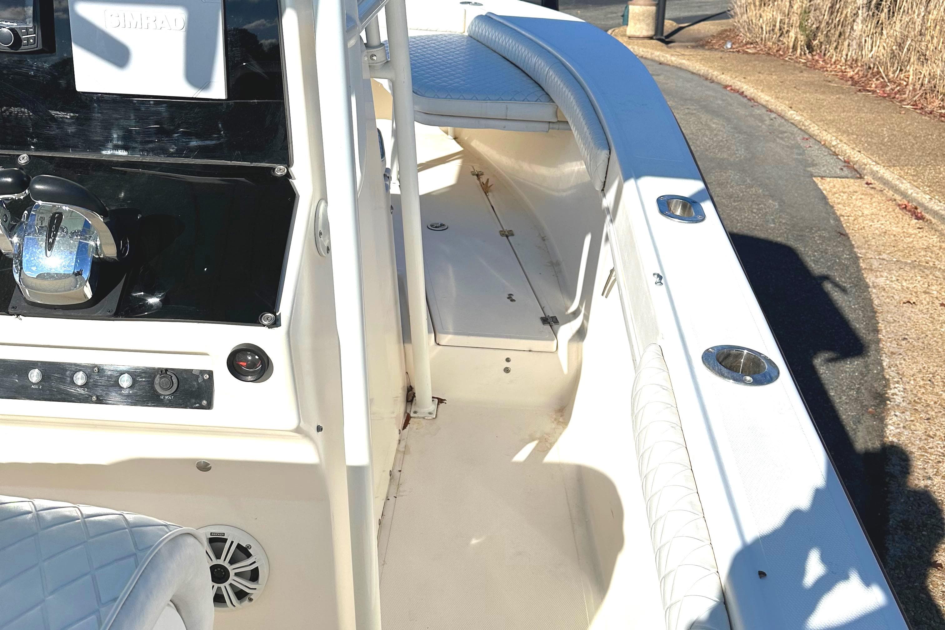 2006 KenCraft 230 SEA KING boat interior with steering console and seating.