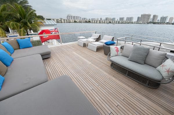 Spacious deck of 2017 Sanlorenzo SL106 yacht with modern seating and waterfront view.