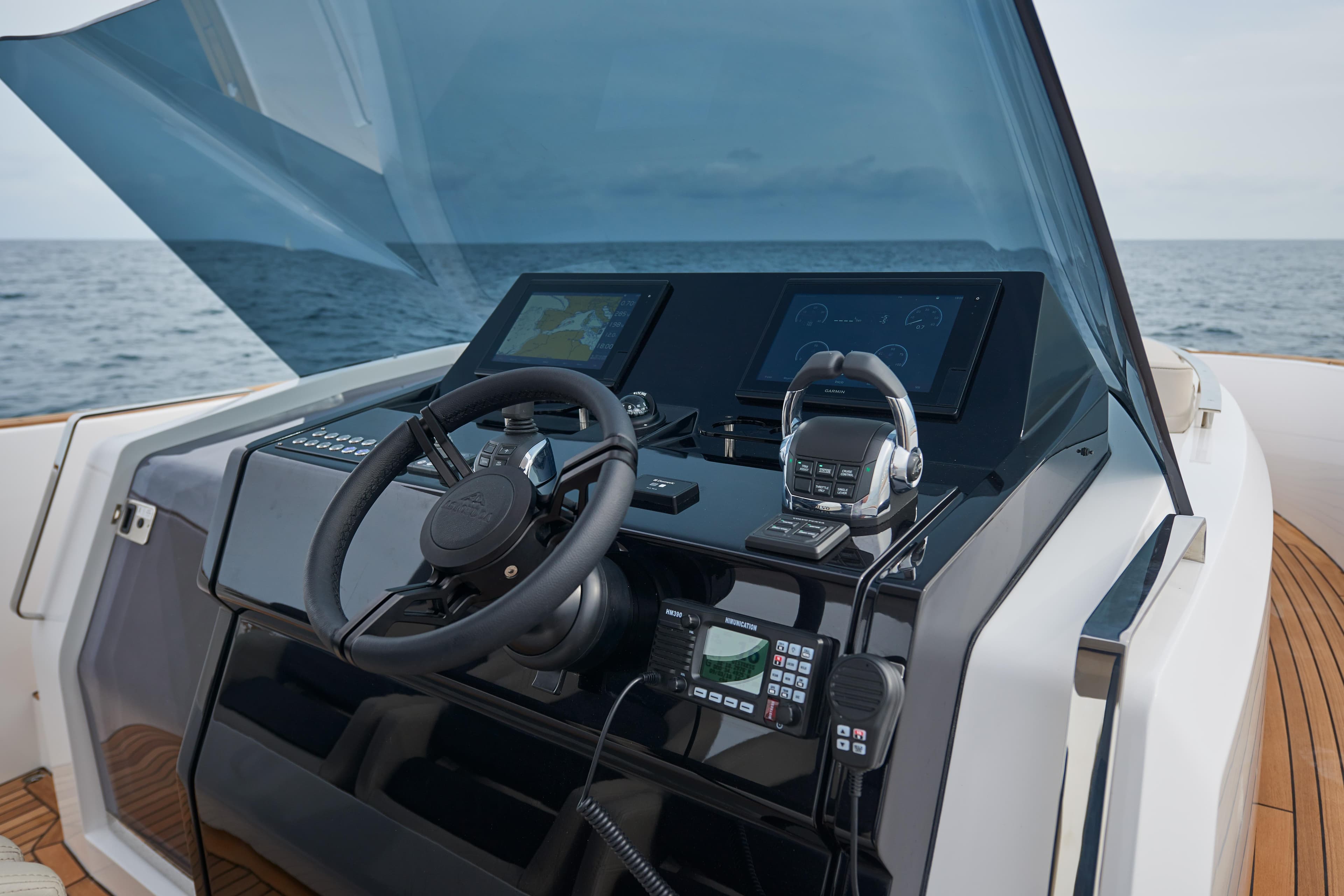 Cockpit of 2026 Astondoa 377 Coupe yacht with modern navigation controls.