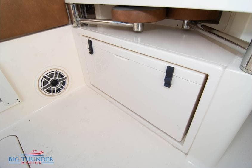 2022 Scout 350 LXZ boat interior with storage compartment and speaker.