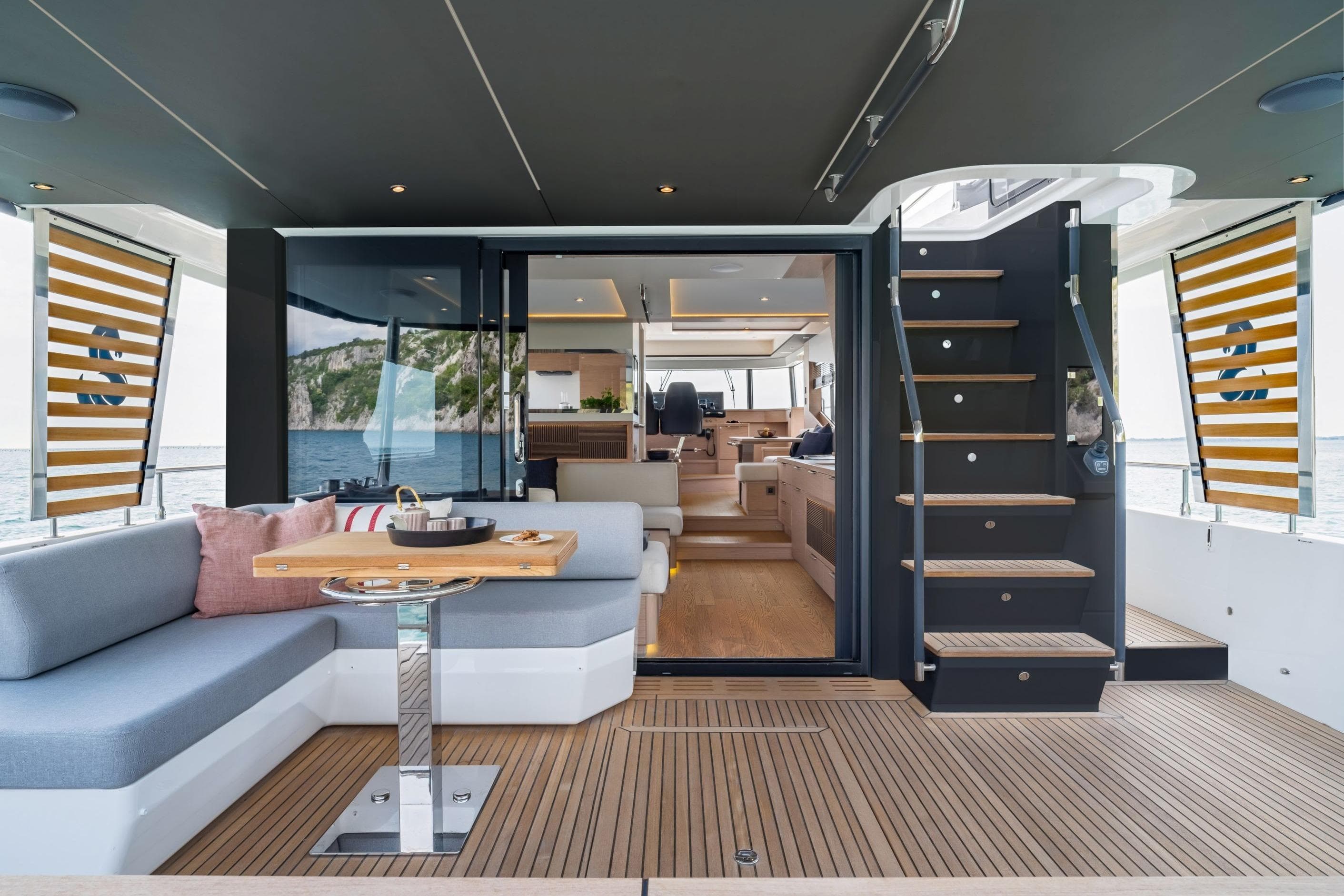 Luxurious 2025 Beneteau Grand Trawler 63 yacht interior with elegant seating and modern design.