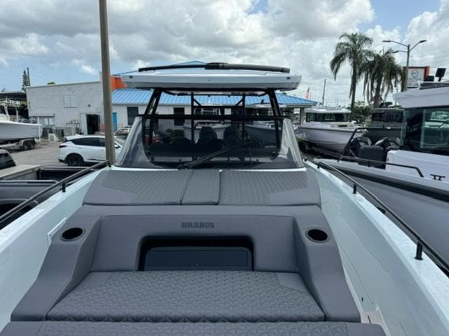 2024 BRABUS Shadow 1000 ST luxury boat, docked with sleek design and modern features.